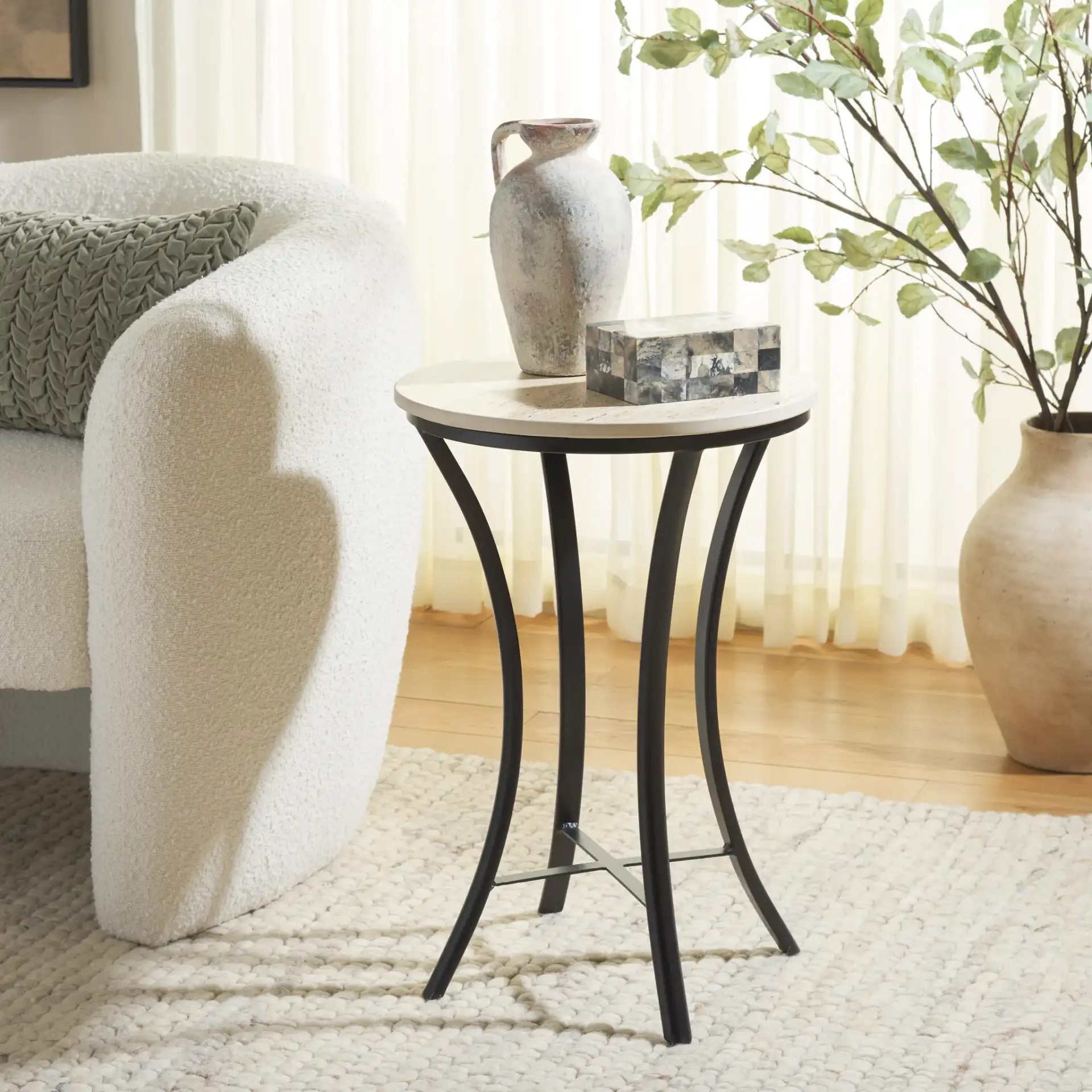 Saxony Travertine Side Table in Beige / Black in a styled room