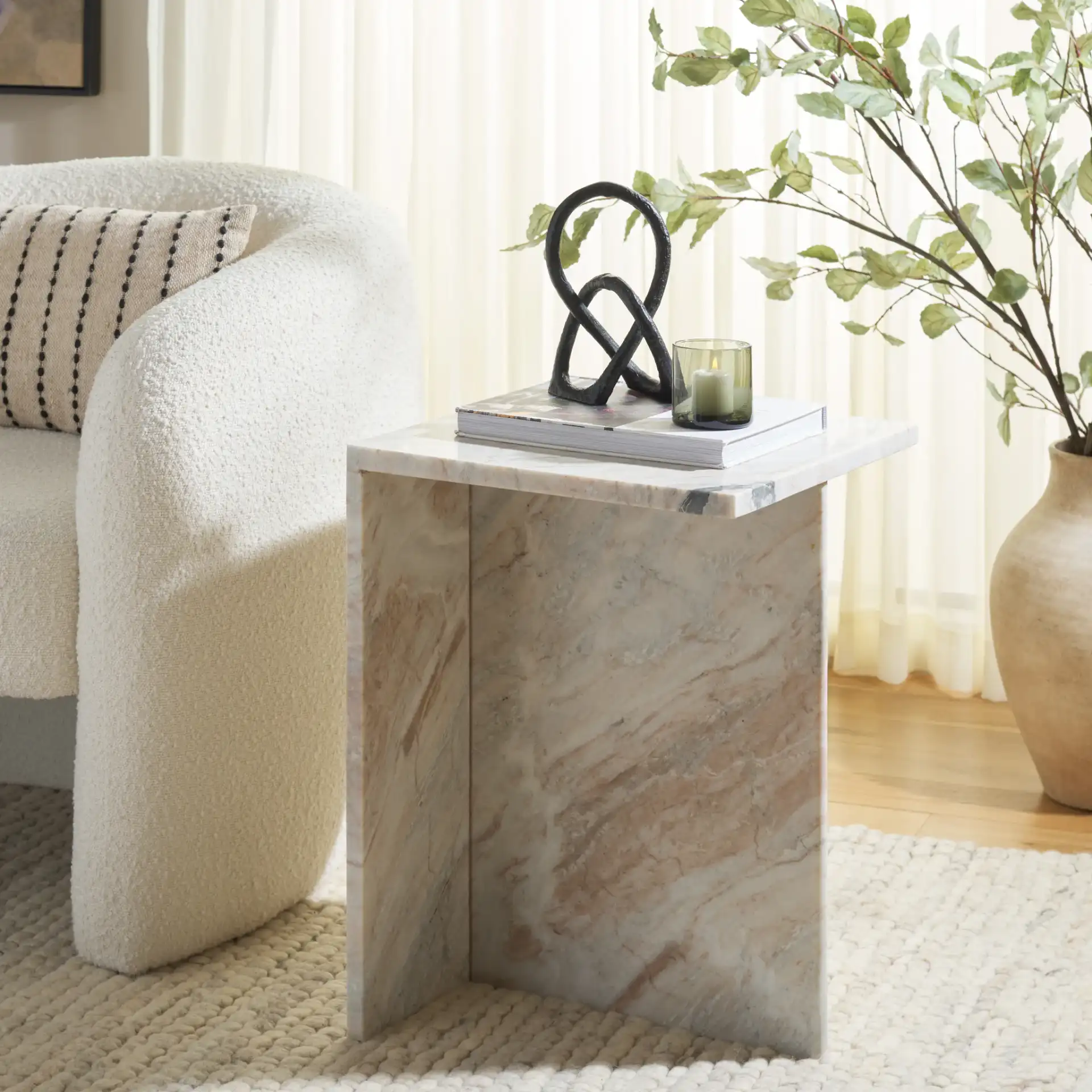 Udo T Marble Side Table in Brown Gray in a styled room