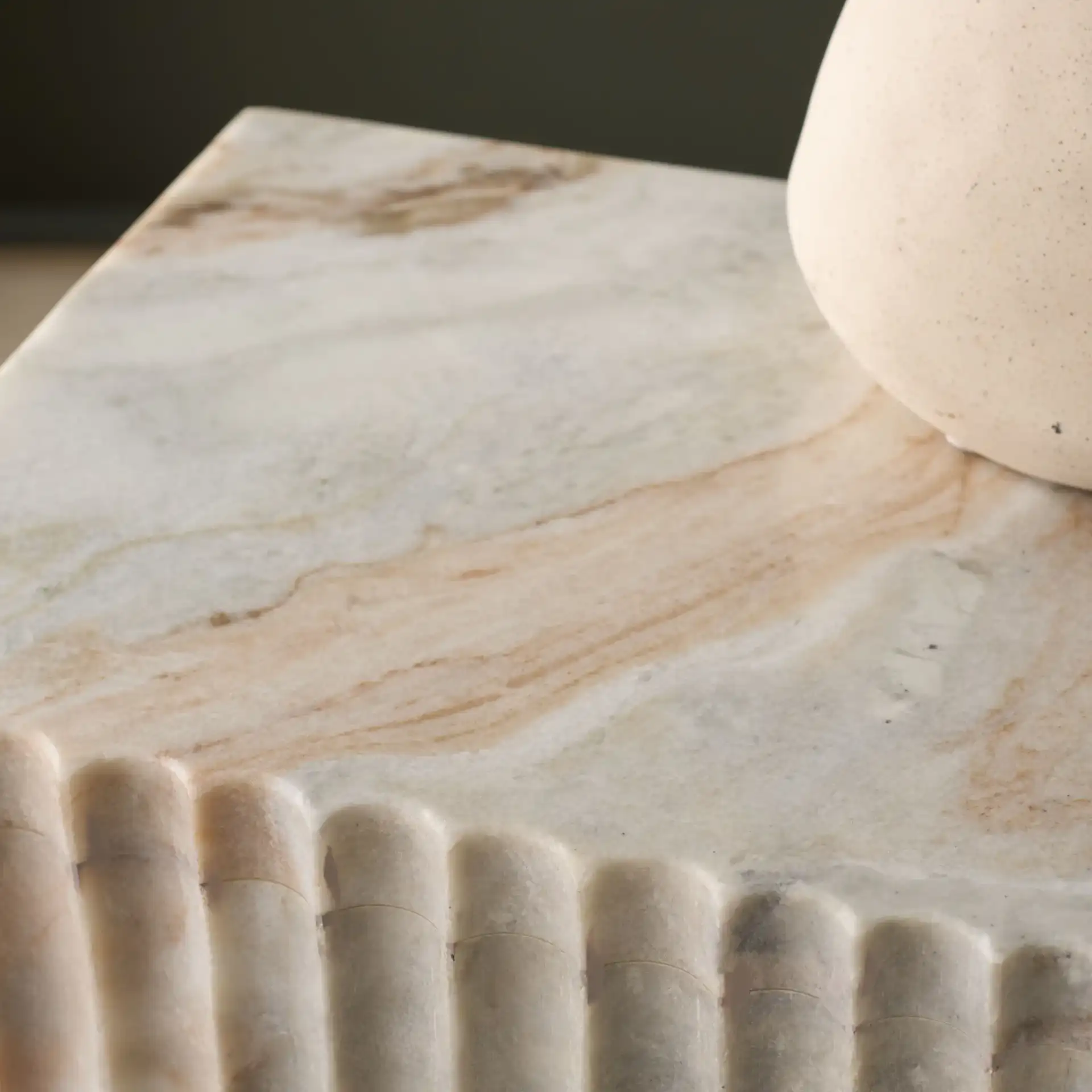Abriana Marble Side Table in Brown / Gray in a styled room