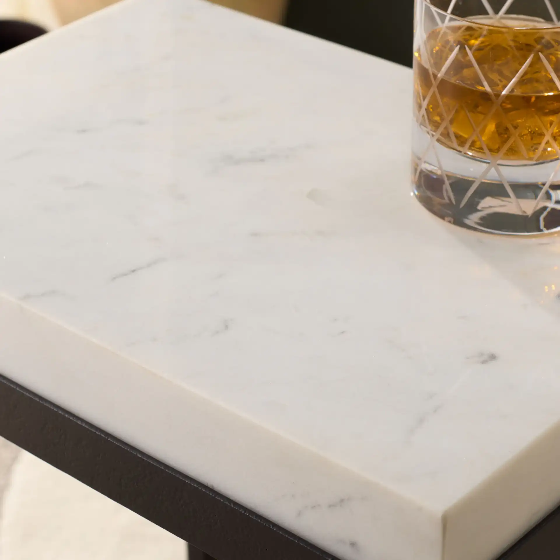 Eldin Marble Side Table in Cream / Black in a styled room