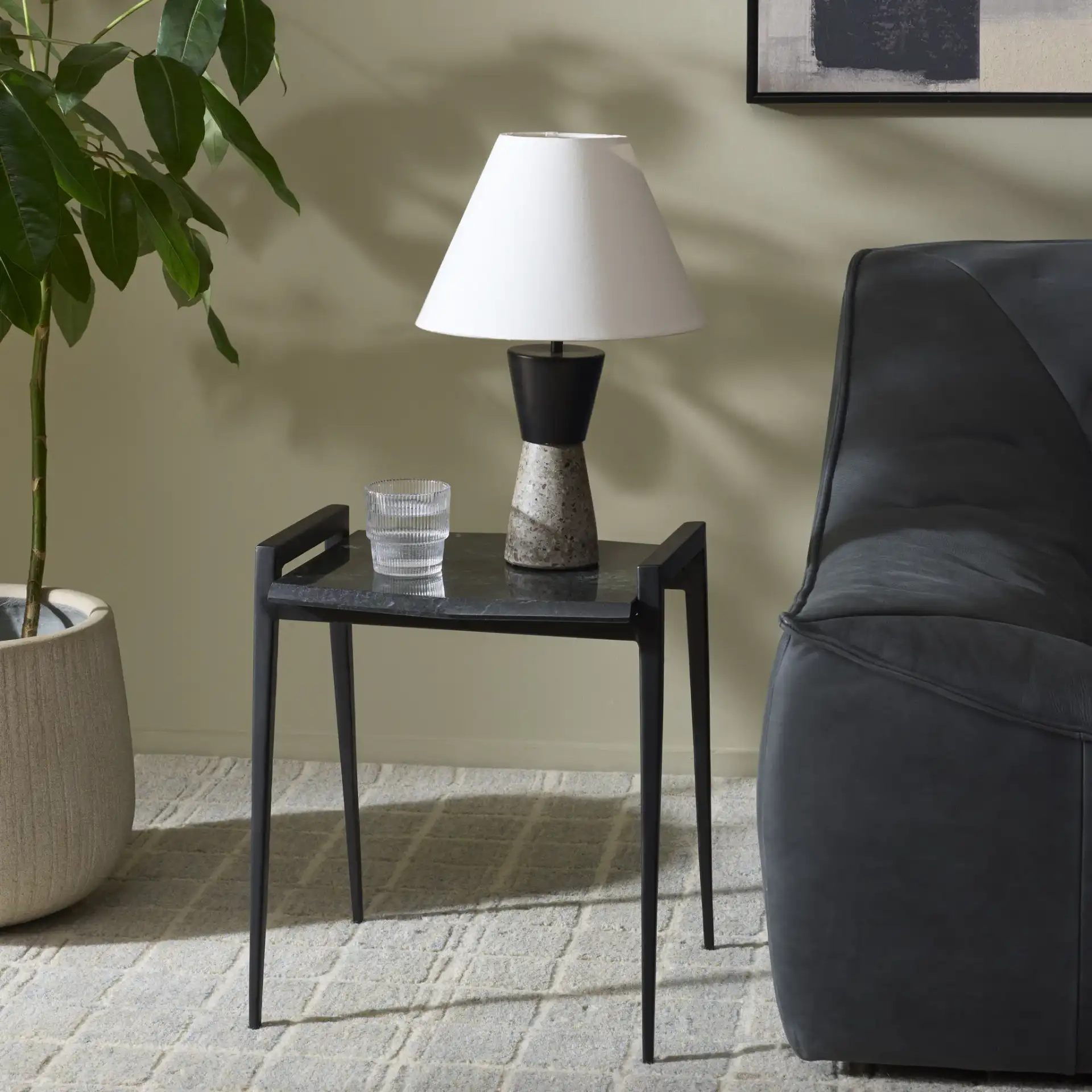 Cari Marble Top Accent Table in Black / Green in a styled room