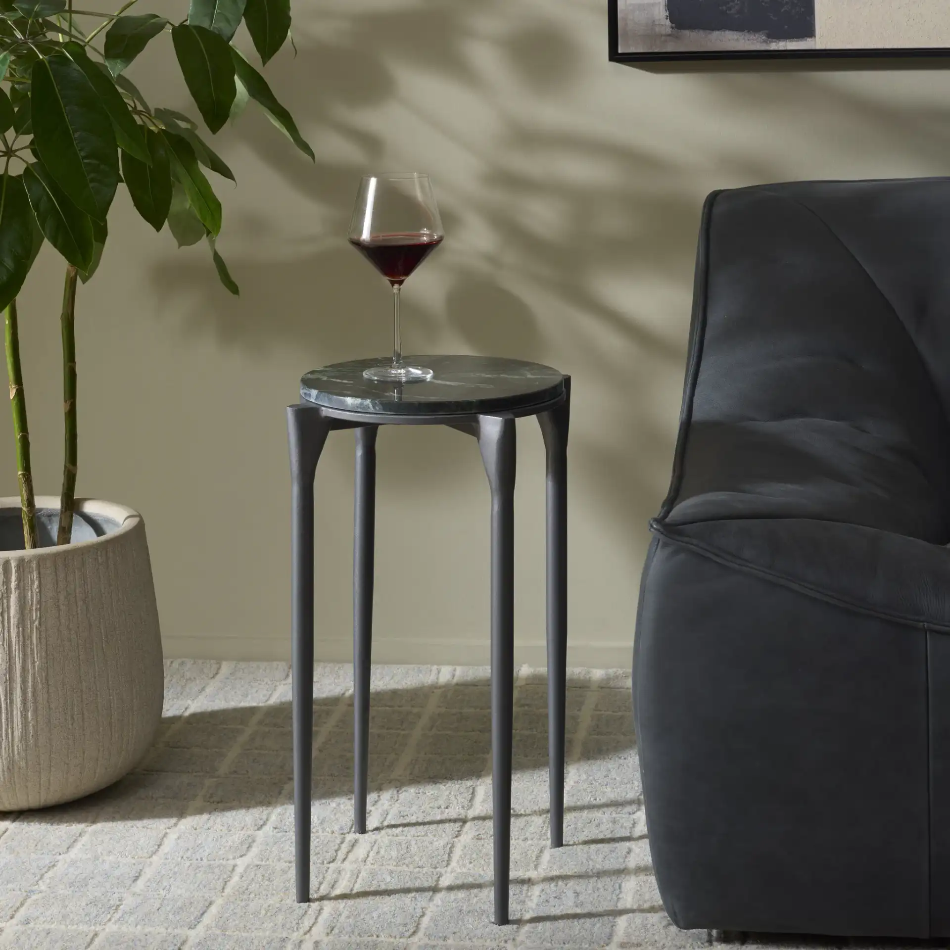 Jaynah Accent Table in Gray / Green in a styled room