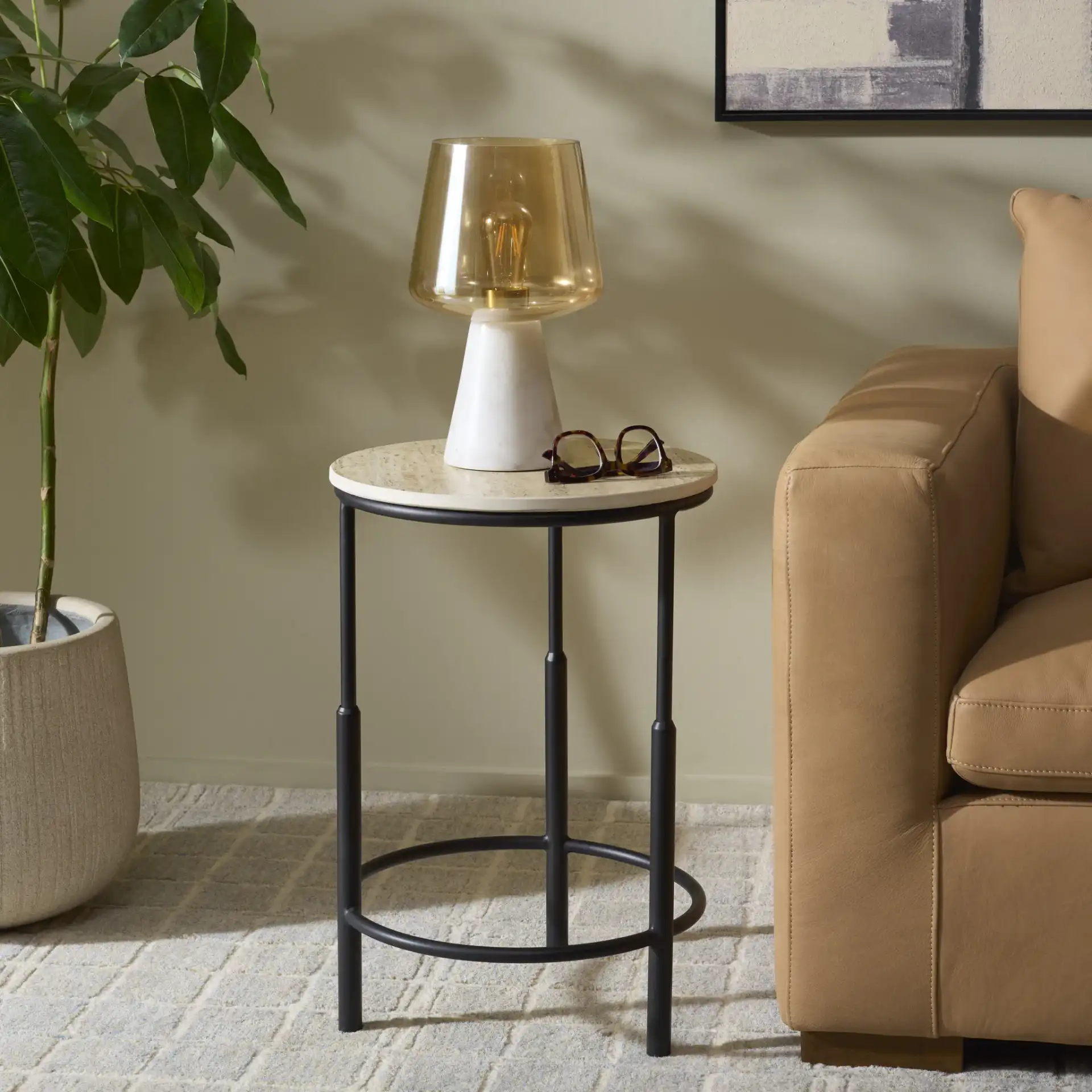 Corrine Accent Table in Black / Beige in a styled room