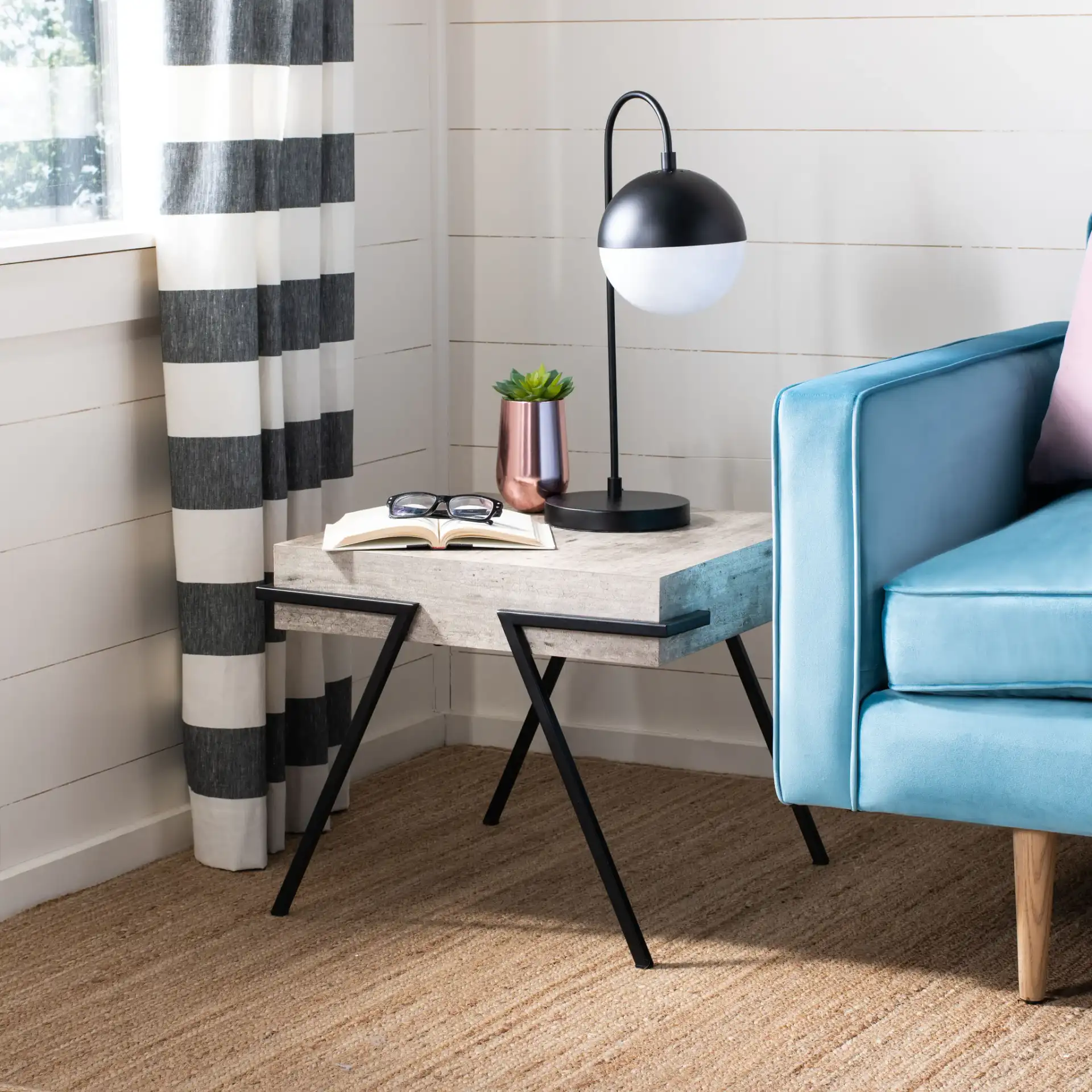 Jette Accent Table in Light Gray Faux Concrete / Black in a styled room