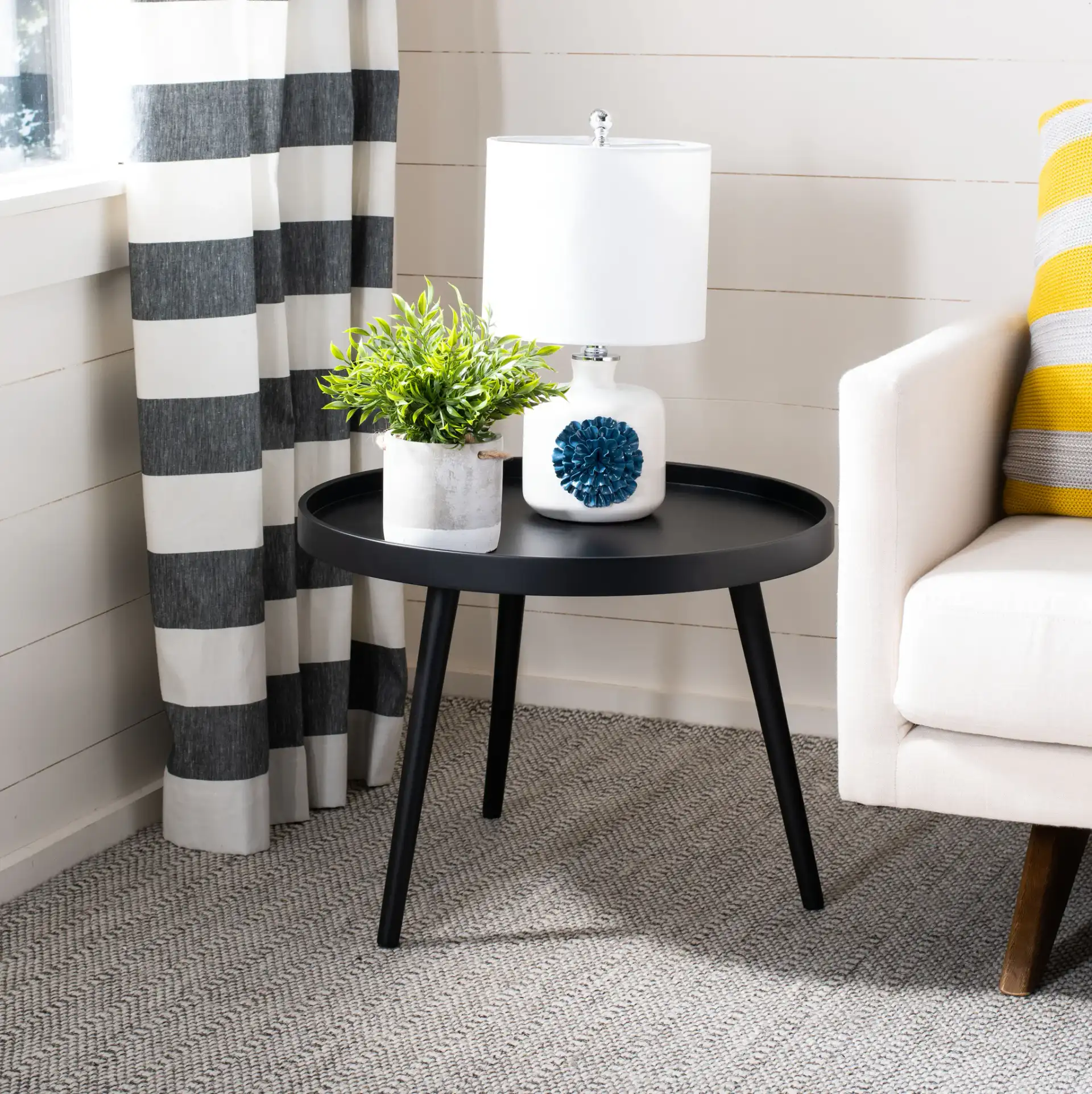 Fritz Round Tray Side Table in Black in a styled room