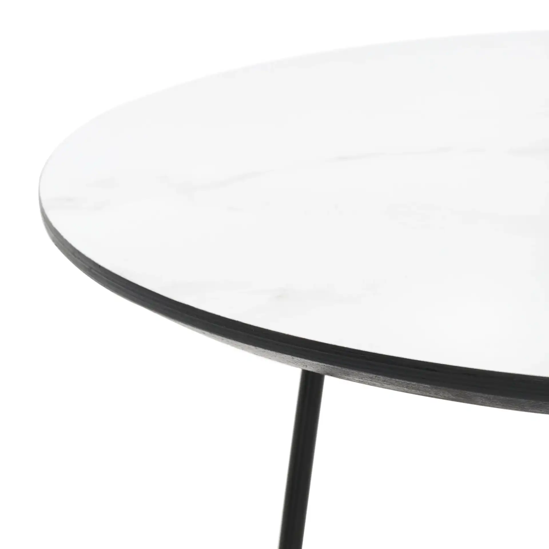 Avani Round Side Table in White / Black in a styled room