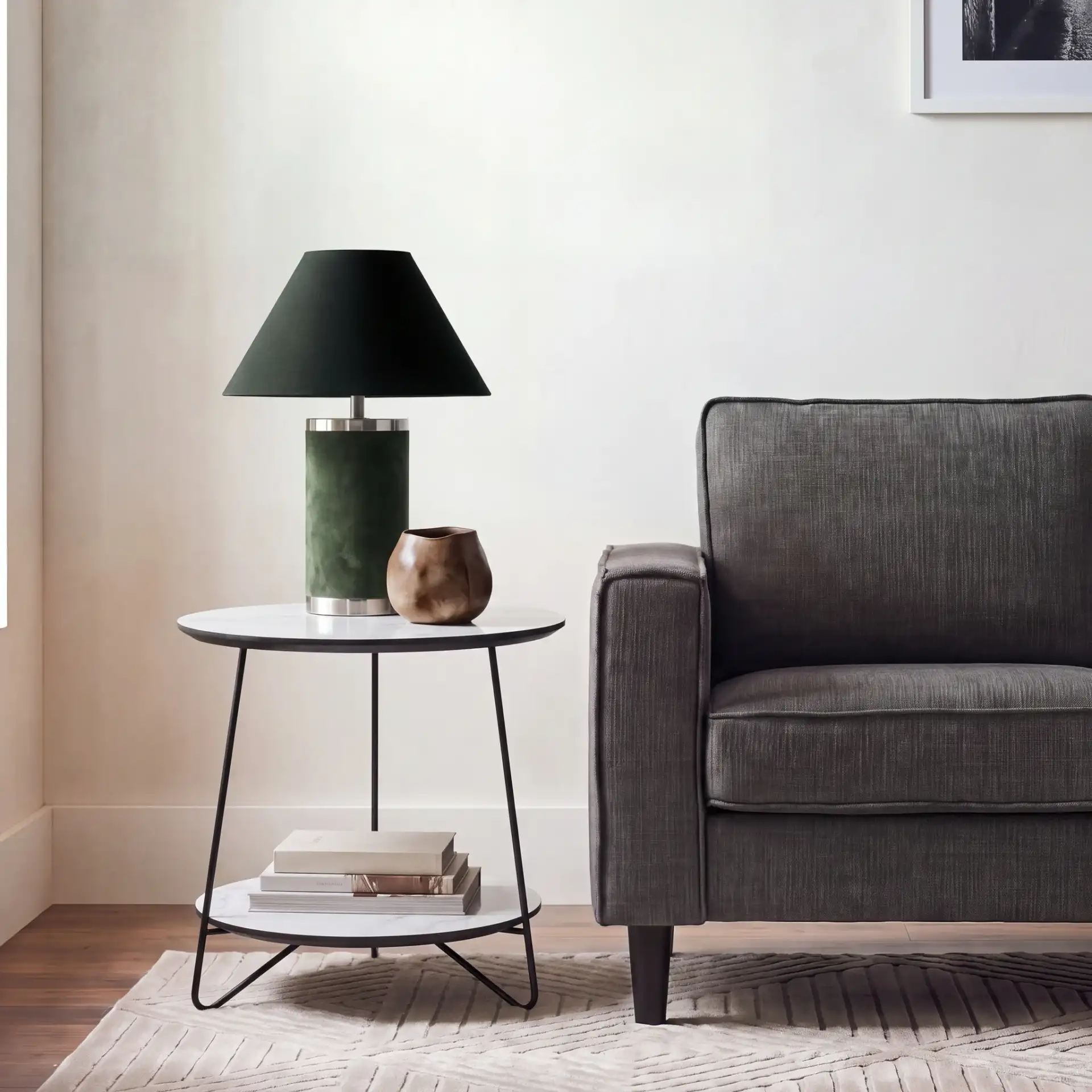 Avani Round Side Table in White / Black in a styled room