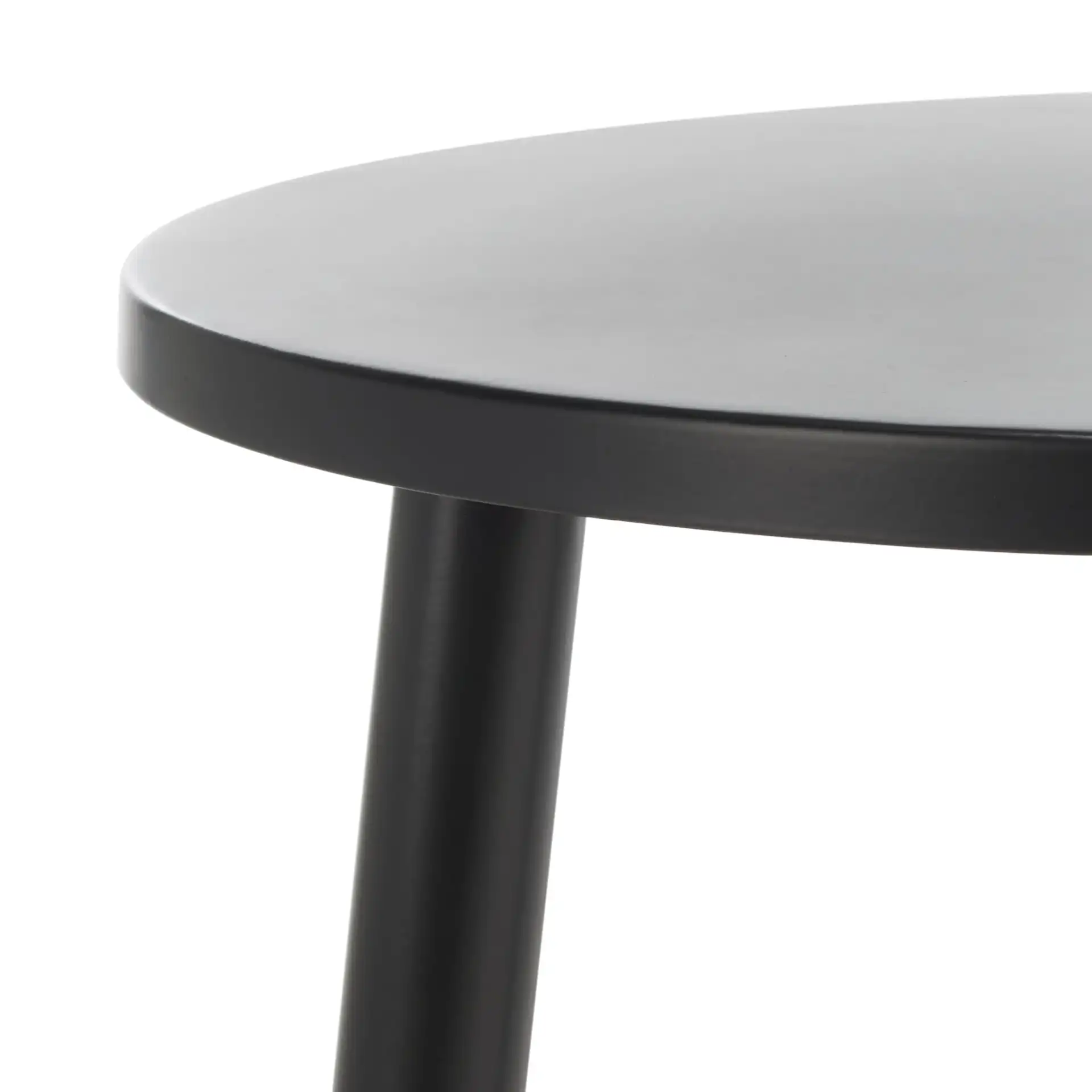 Ivitrio Round Accent Table in Black in a styled room