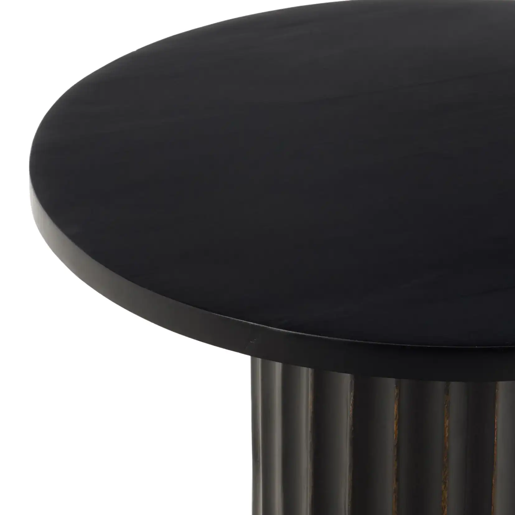 Yaseen Accent Table in Black in a styled room
