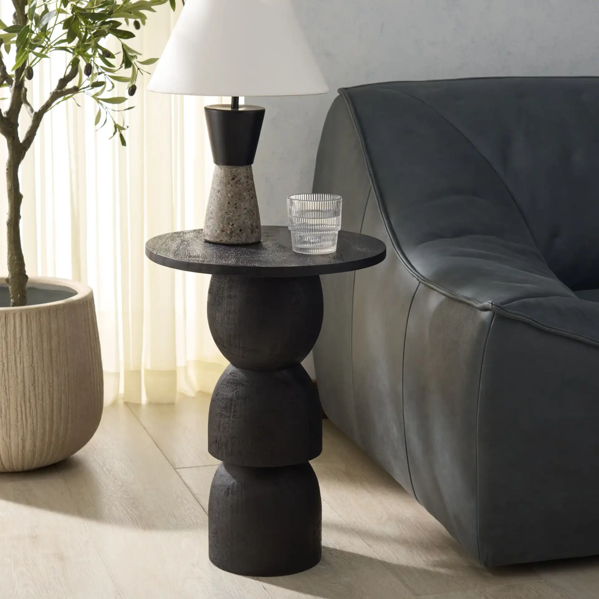Andrey Accent Table in Black in a styled room