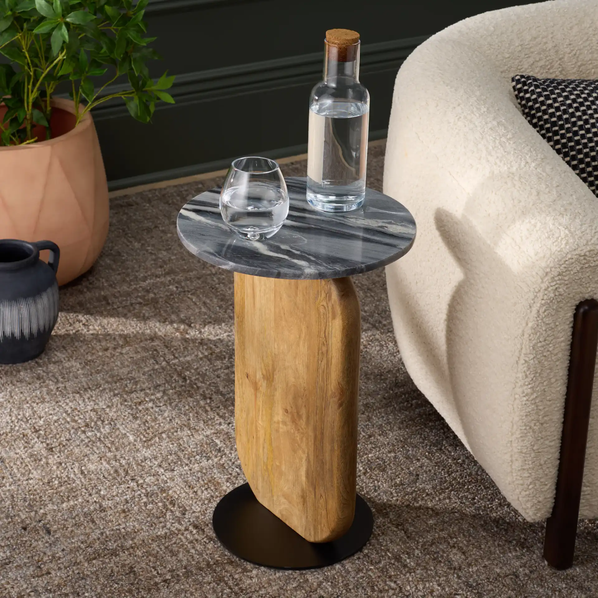 Kokhy Side Table in Natural / Black in a styled room