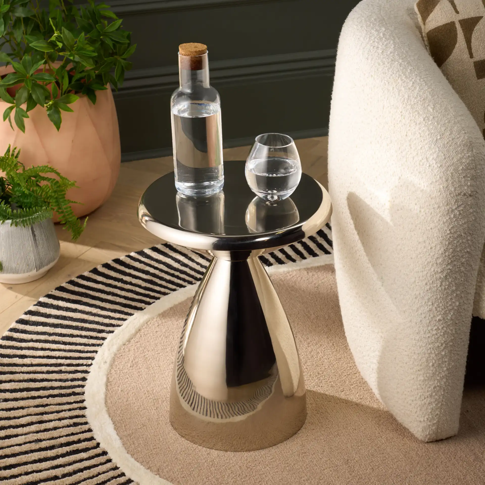Lisian Side Table in Silver in a styled room
