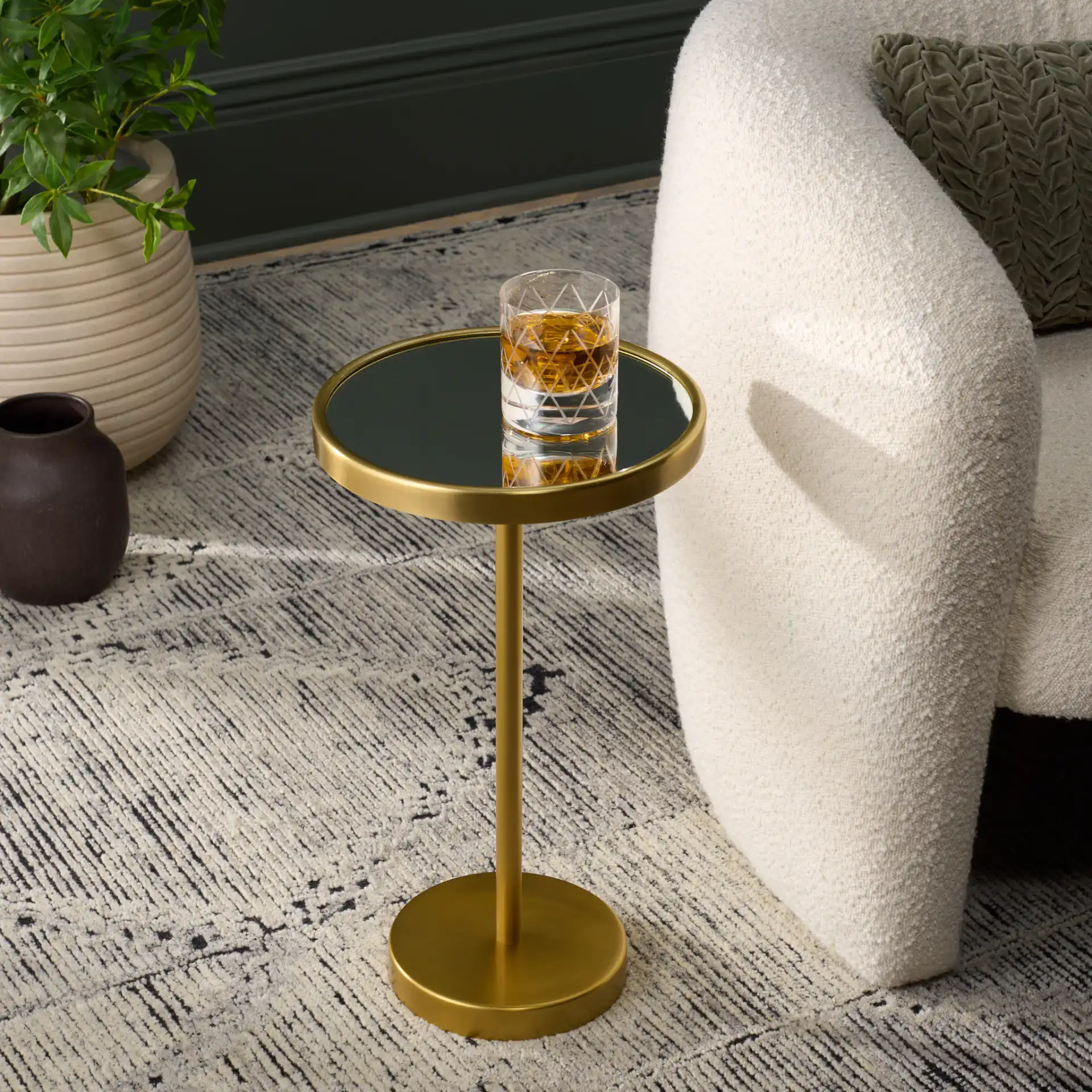 Hentry Side Table in Gold / Mirror in a styled room