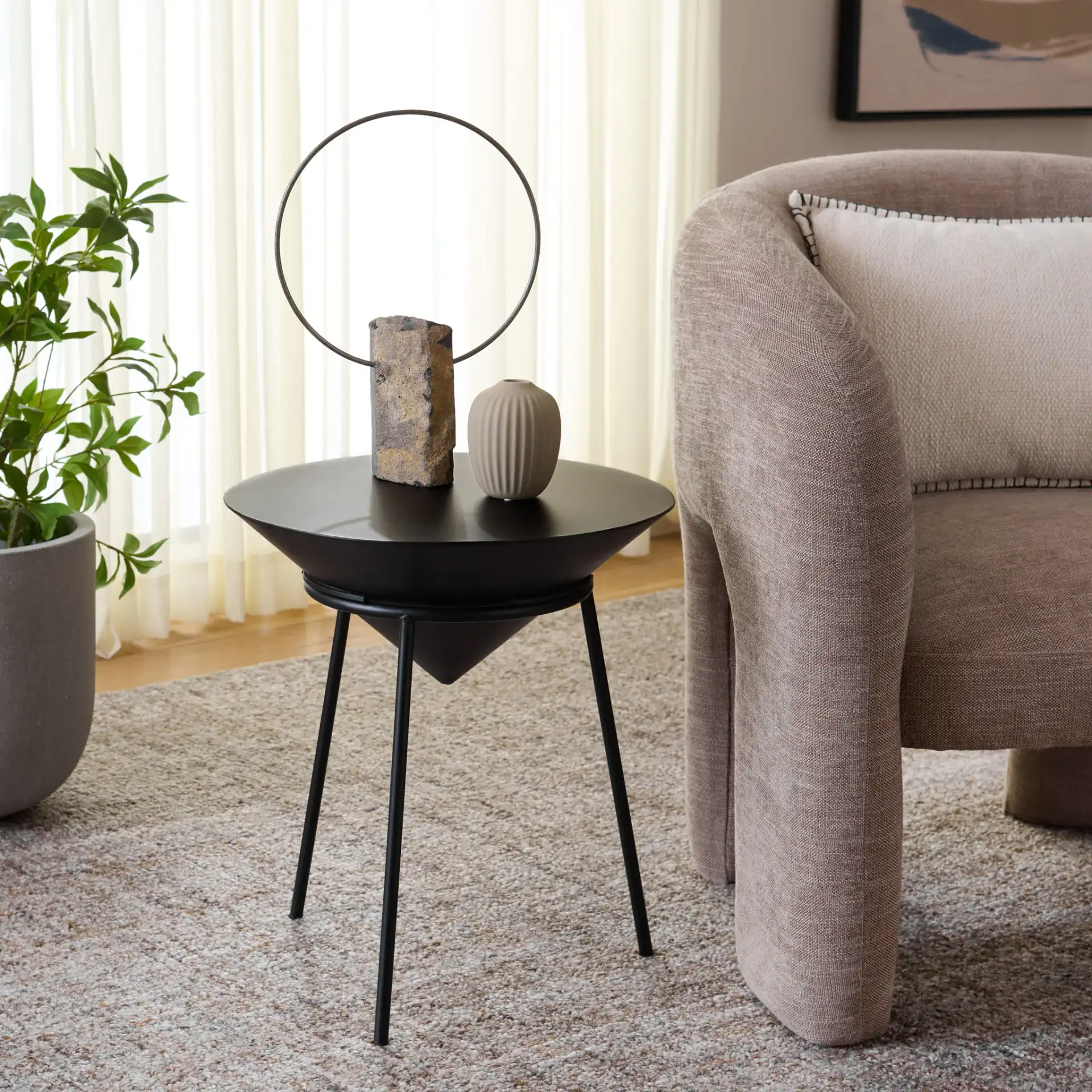 Apuline Side Table in Black in a styled room