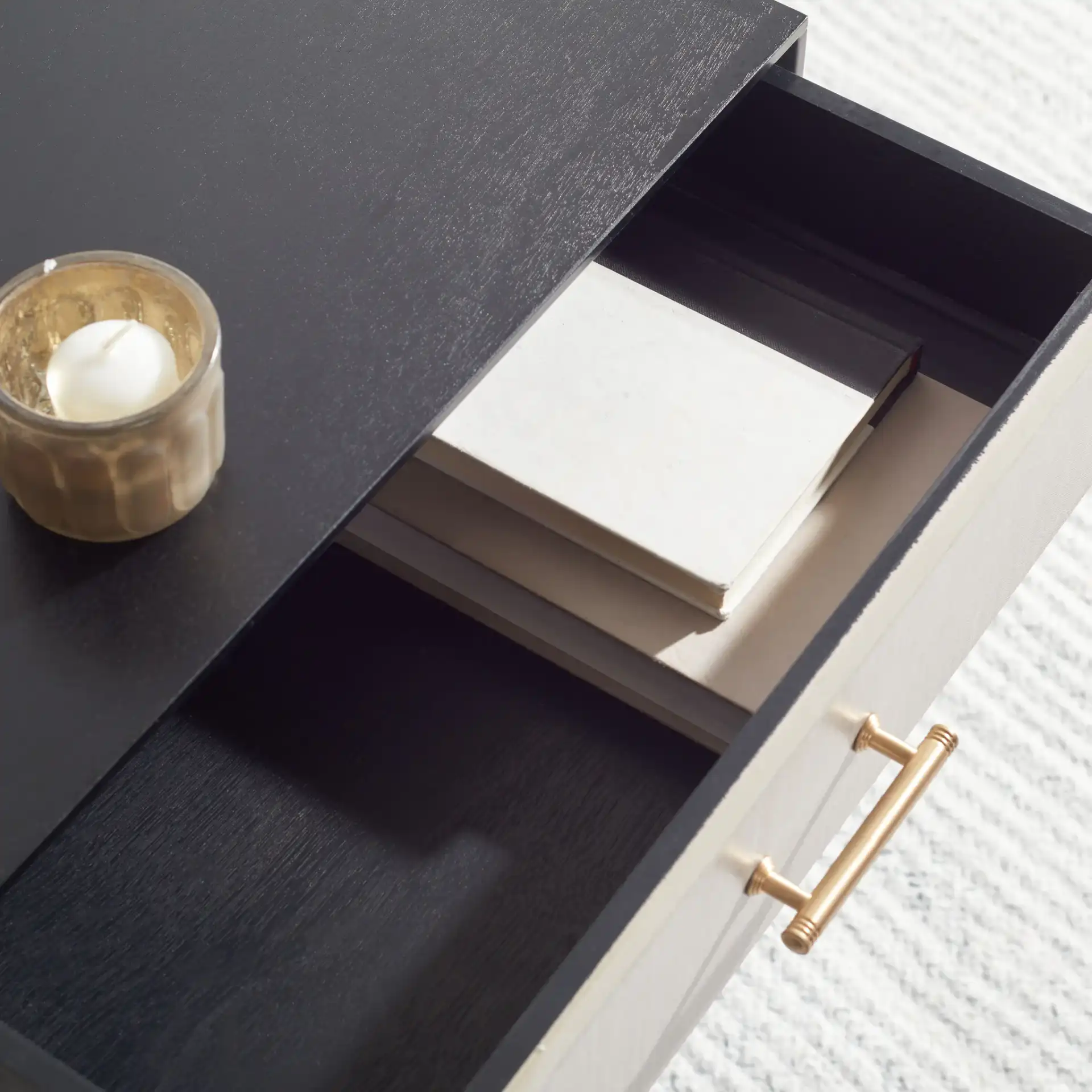 Estella One-Drawer Accent Table in Black in a styled room