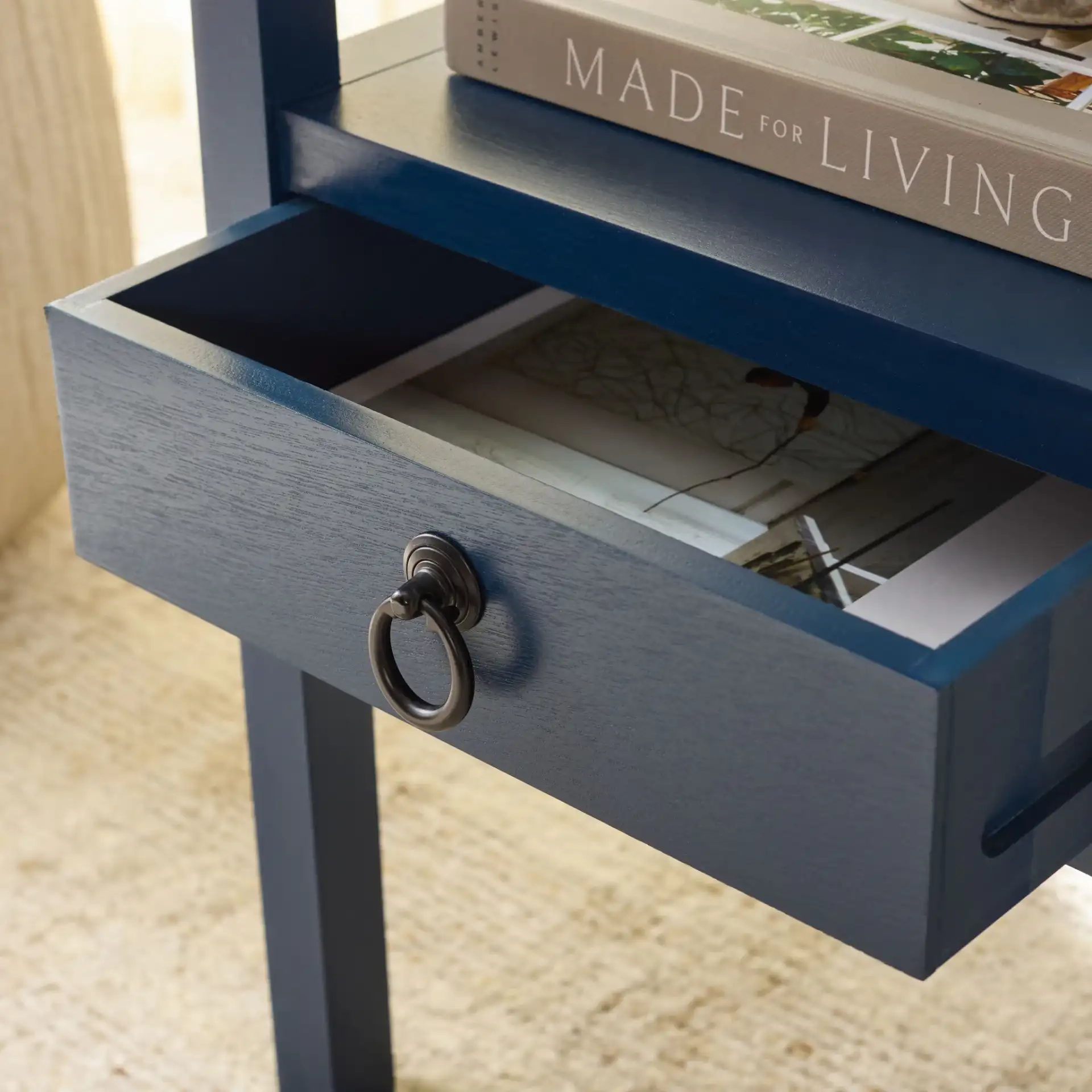 Darlyn One-Drawer Accent Table in Ink Blue in a styled room