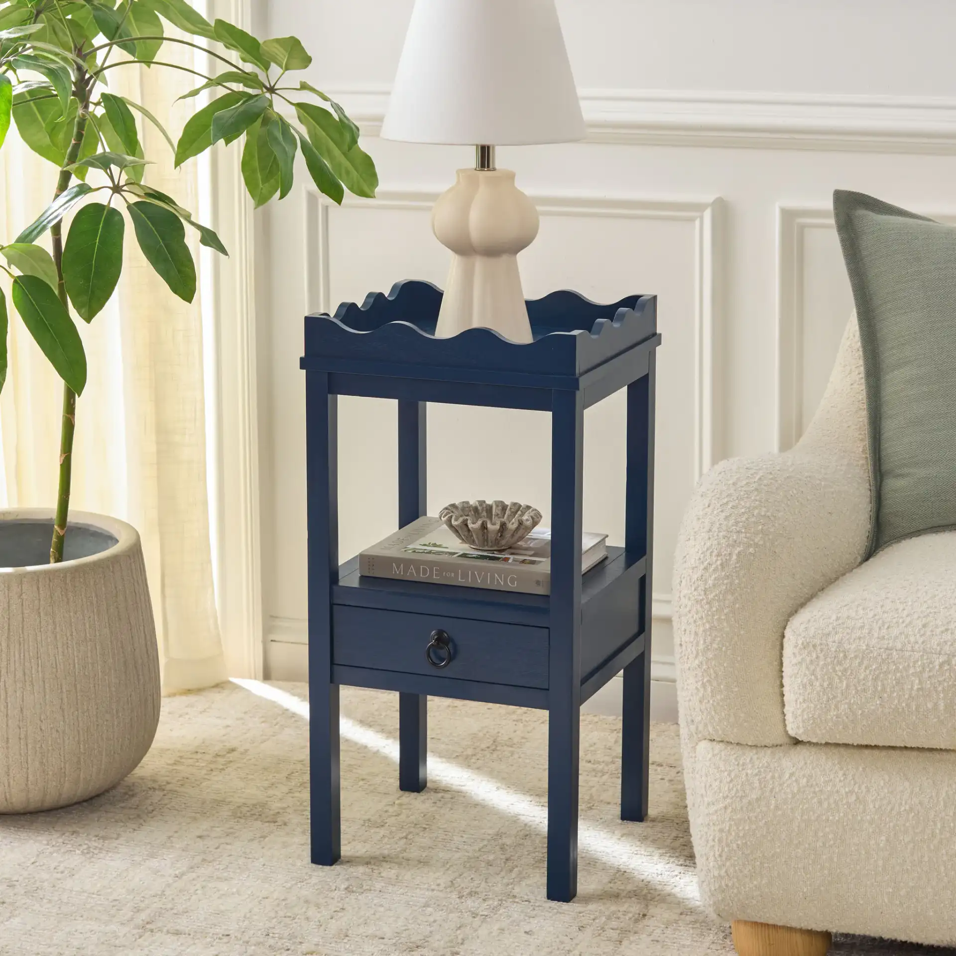 Darlyn One-Drawer Accent Table in Ink Blue in a styled room