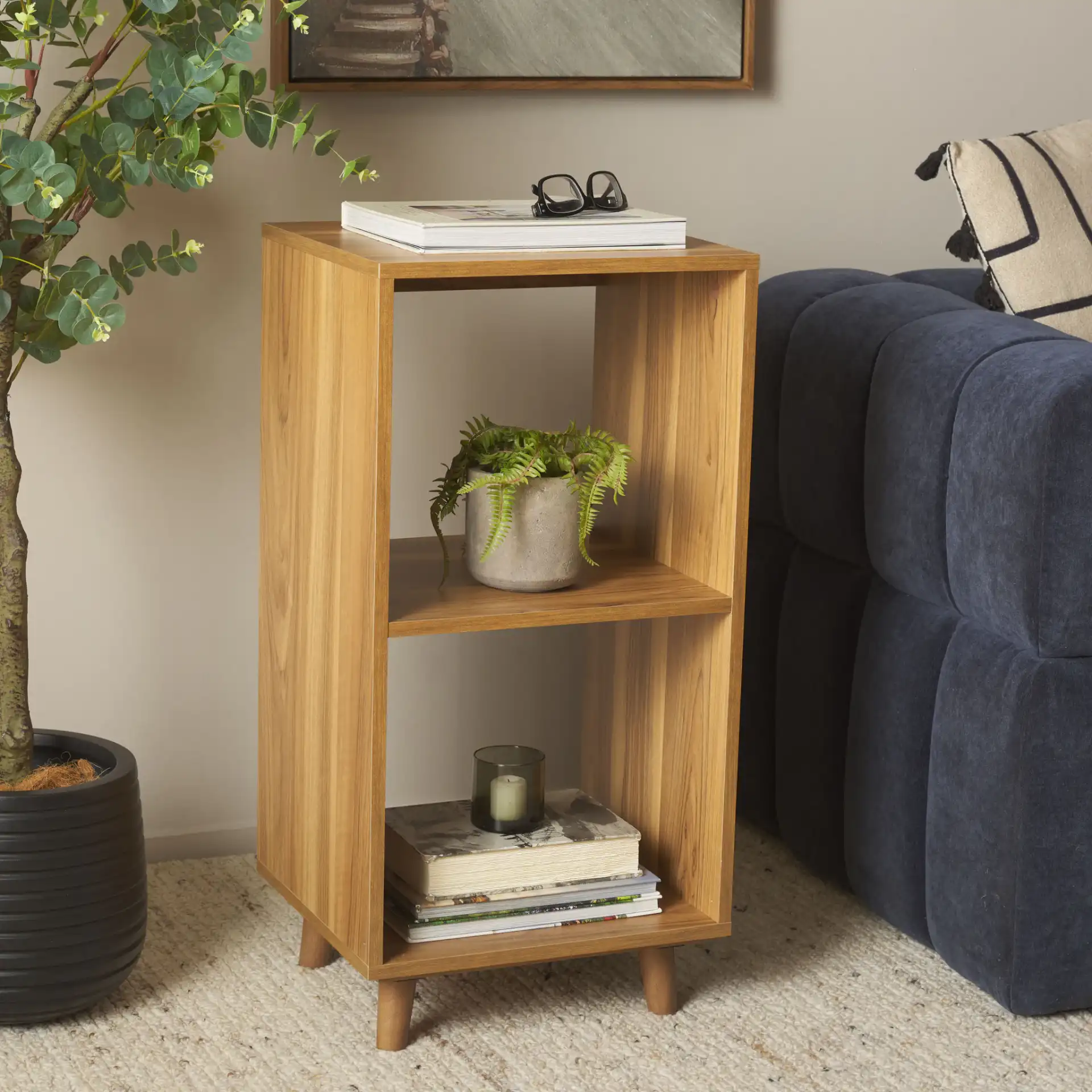 Yona Vertical Accent Table in Black in a styled room