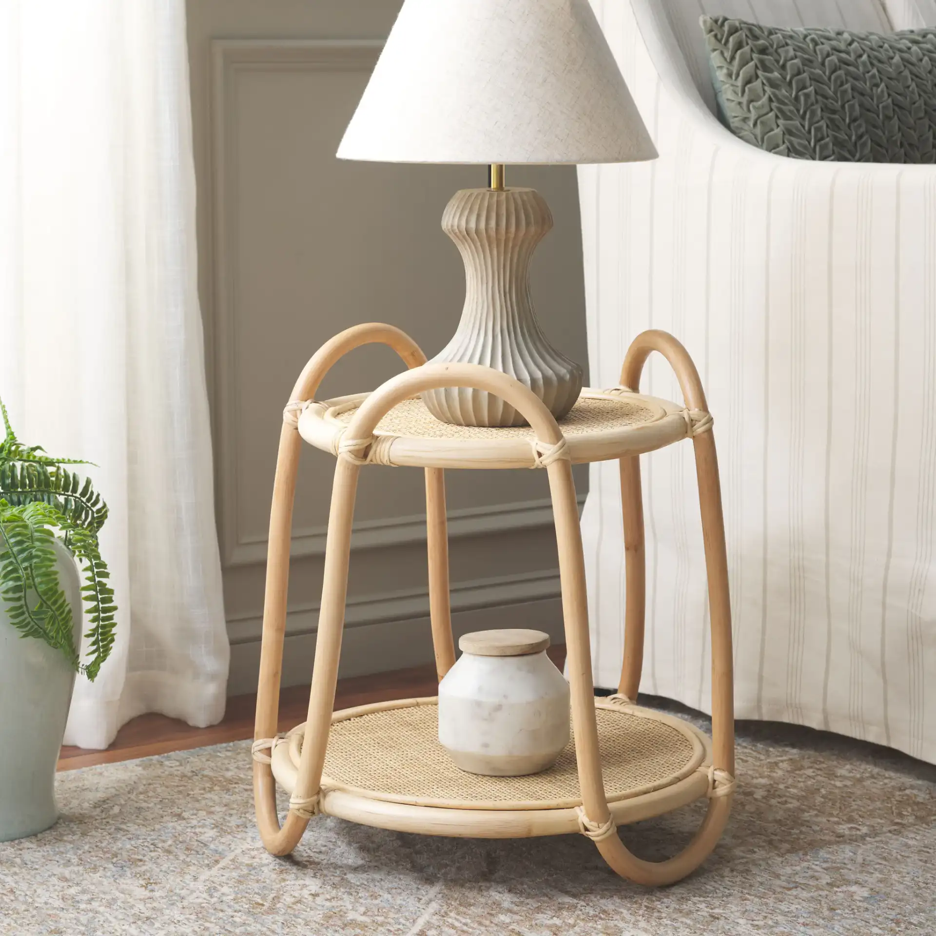 Althea Accent Table in Natural in a styled room