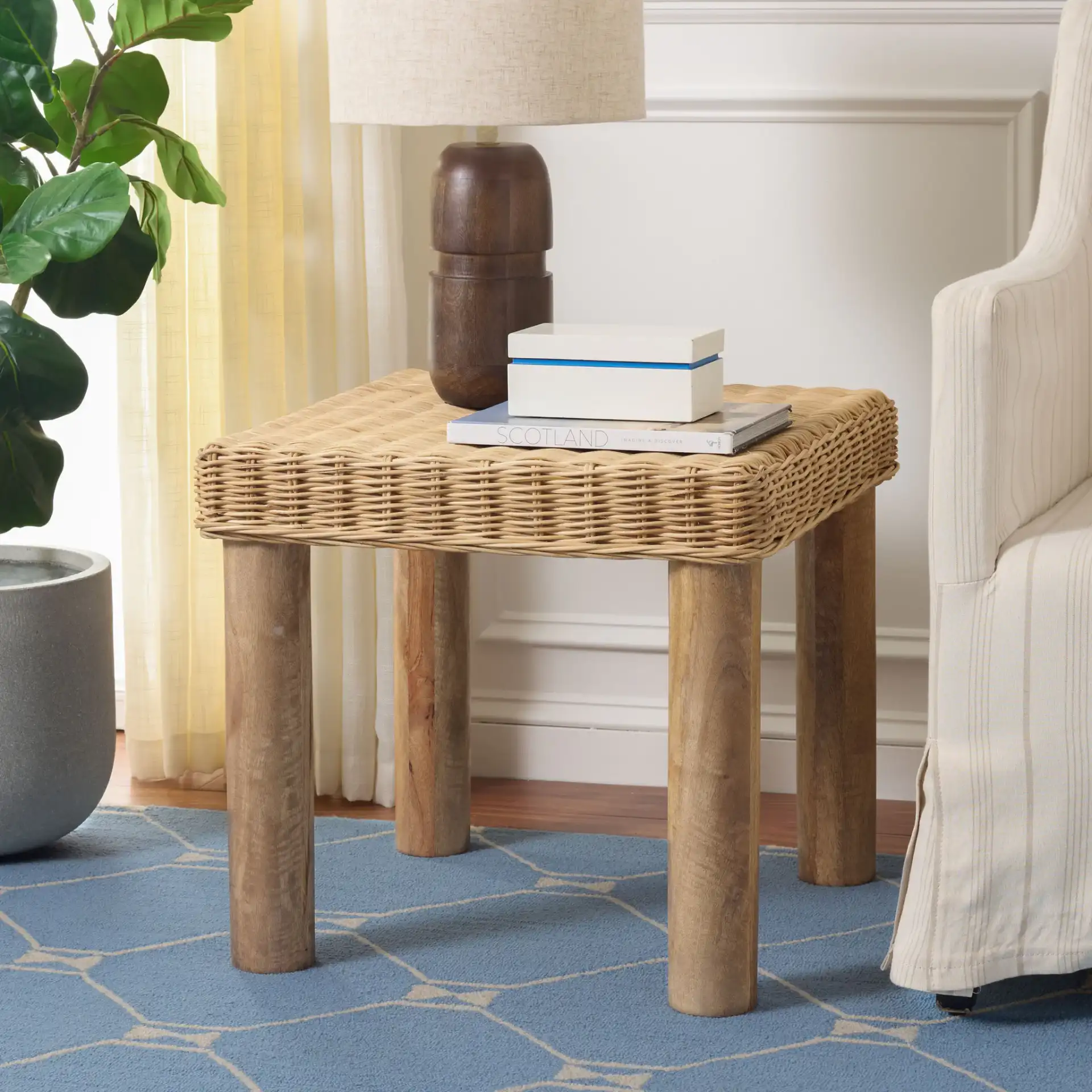 Shazza Weaved Accent Table in Natural in a styled room