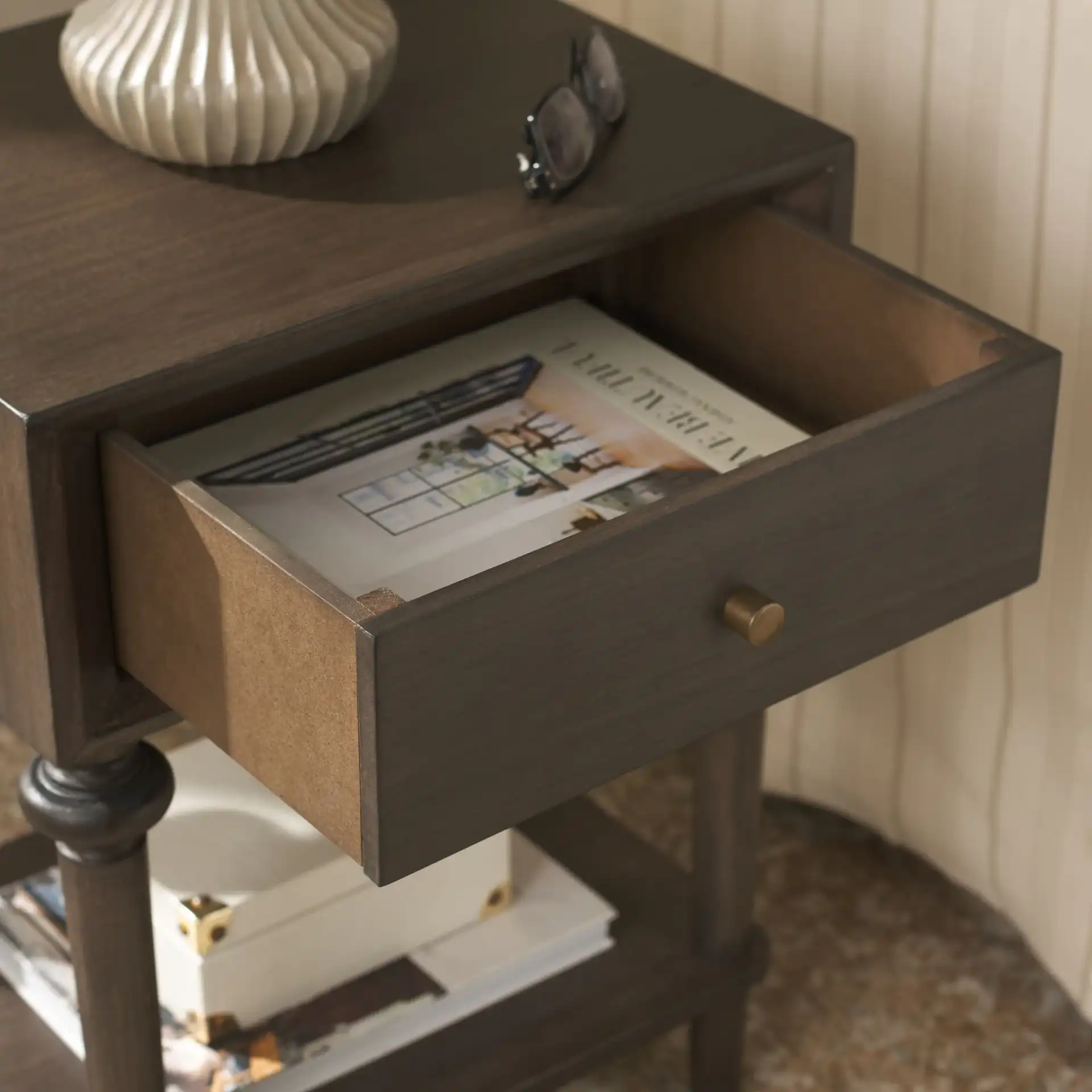 Ambrashi End Table in Dark Gray in a styled room
