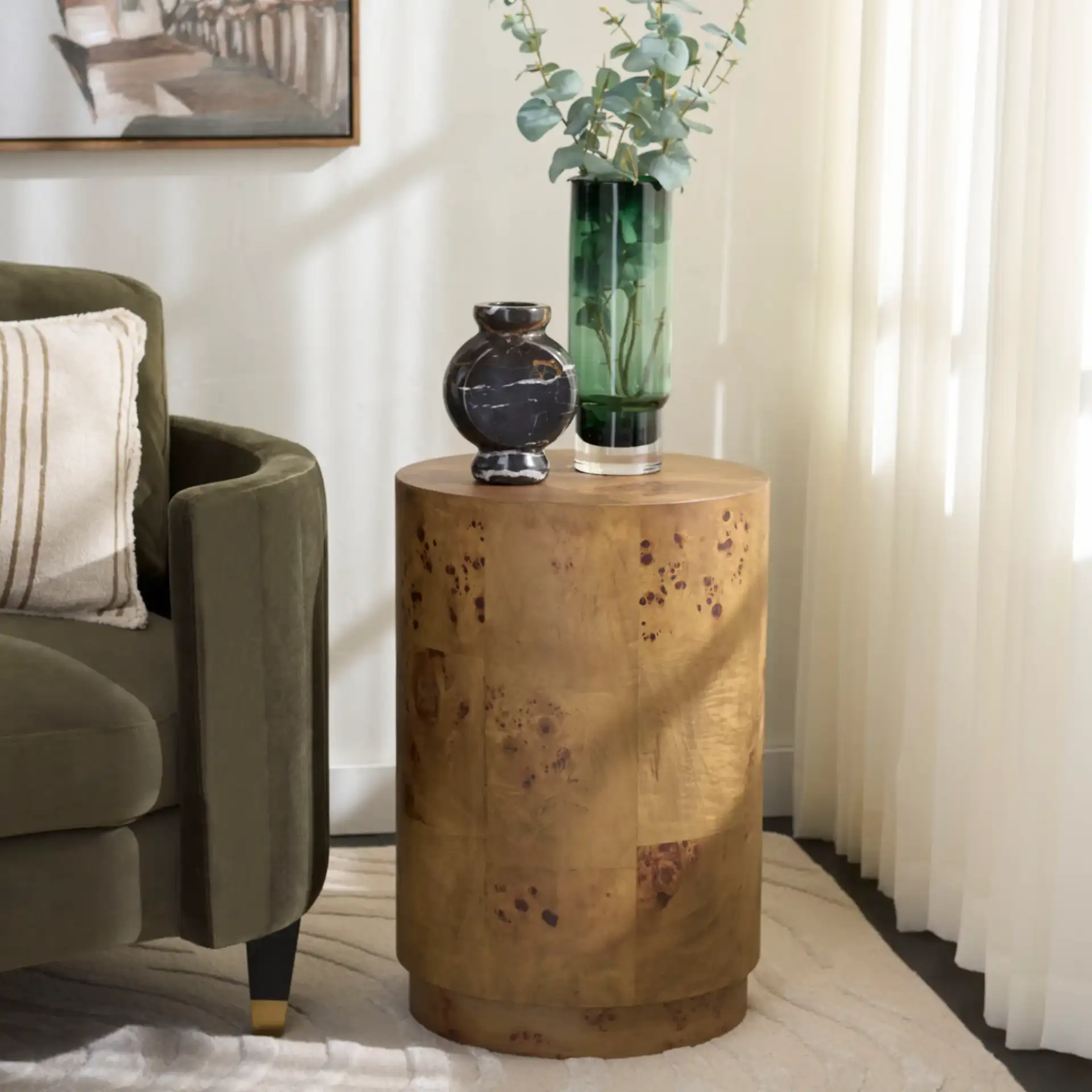 Siya Round Accent Table in Brown in a styled room