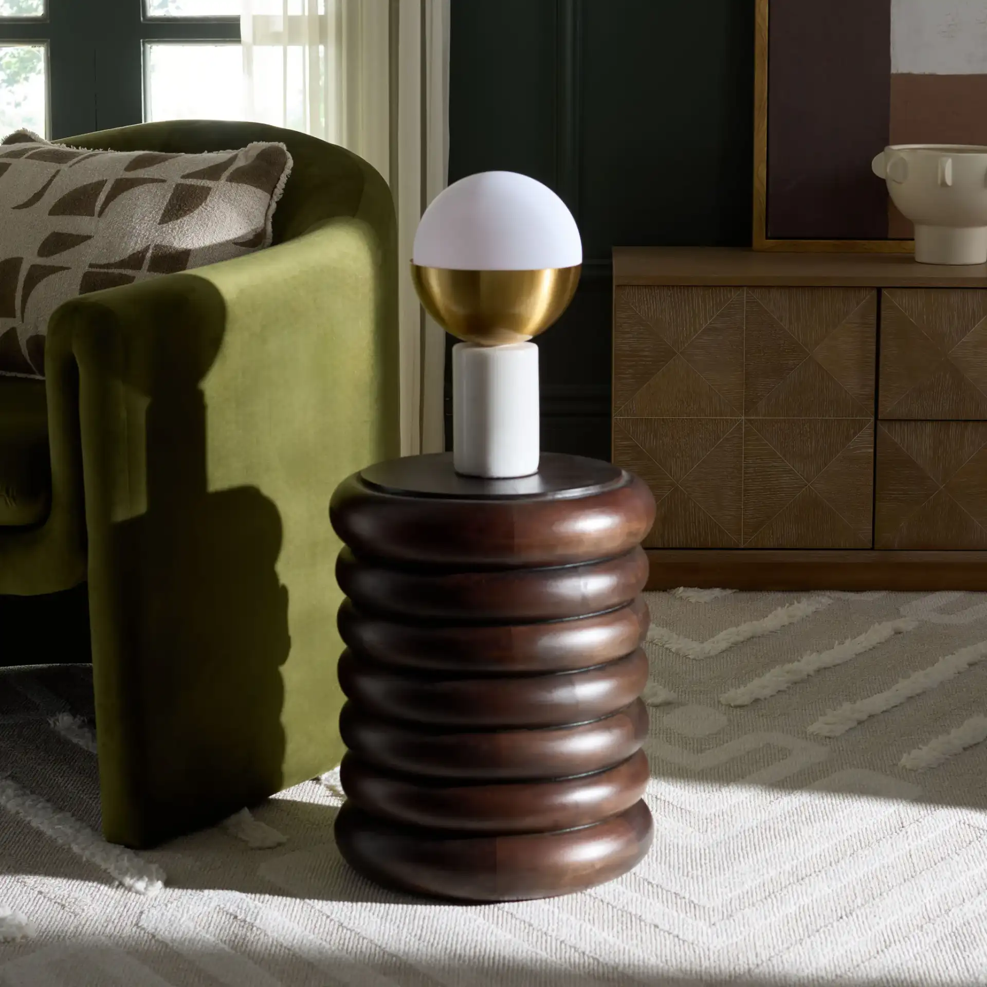 Anatoly Round Accent Table in Brown in a styled room