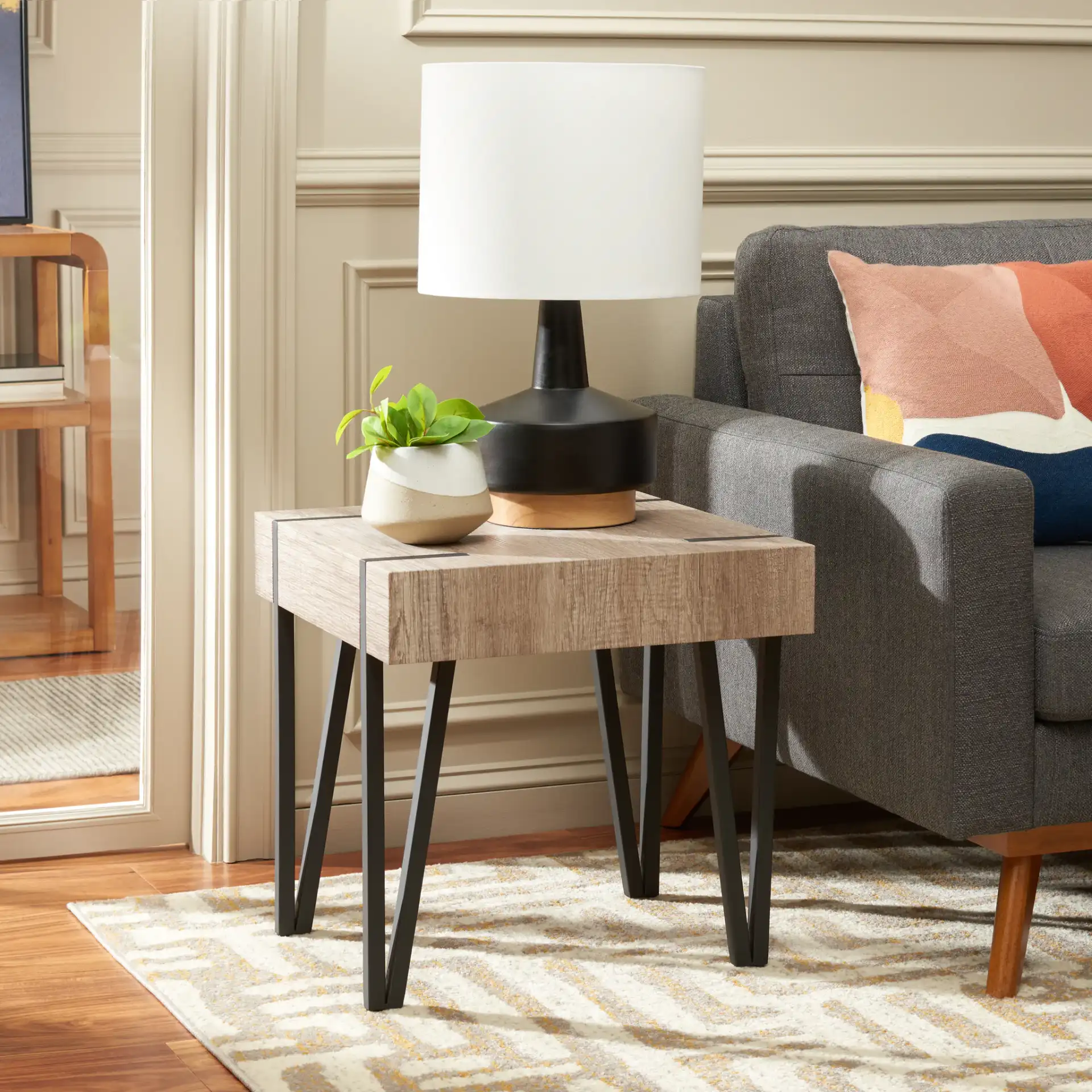Alyssa End Table in Multibrown / Black in a styled room