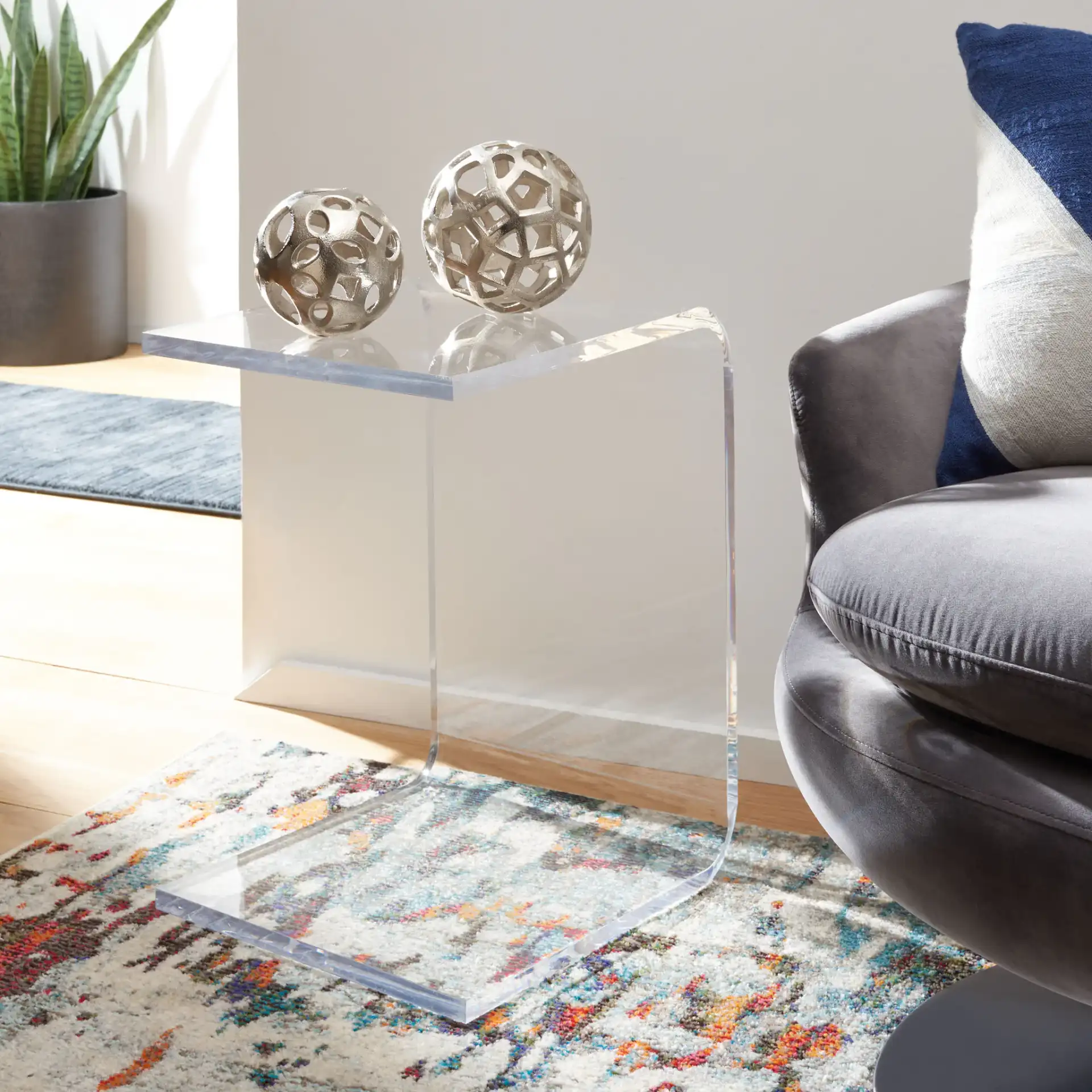 Upton Acrylic Side Table in Clear in a styled room