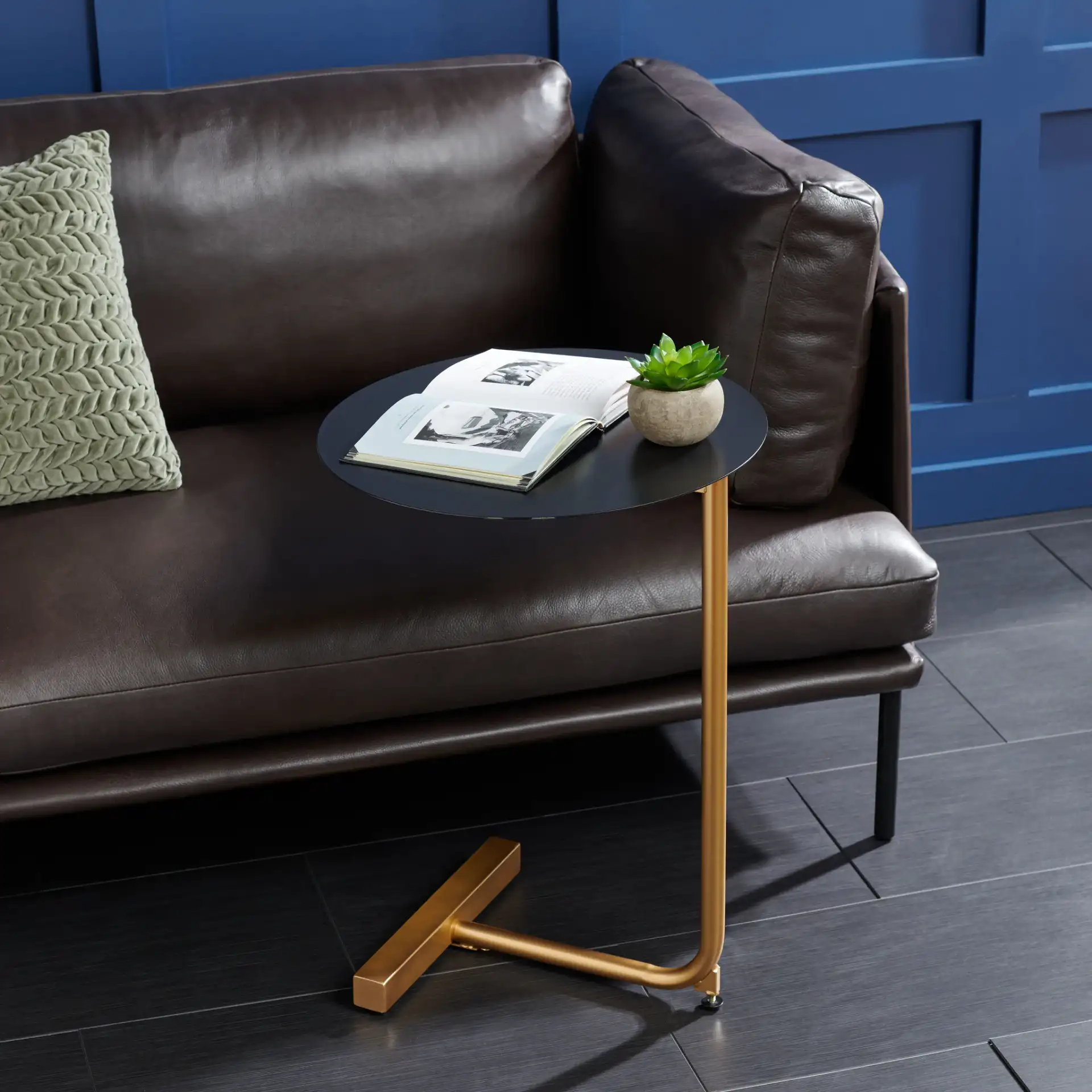 Haylee Round Side Table in White / Gold in a styled room