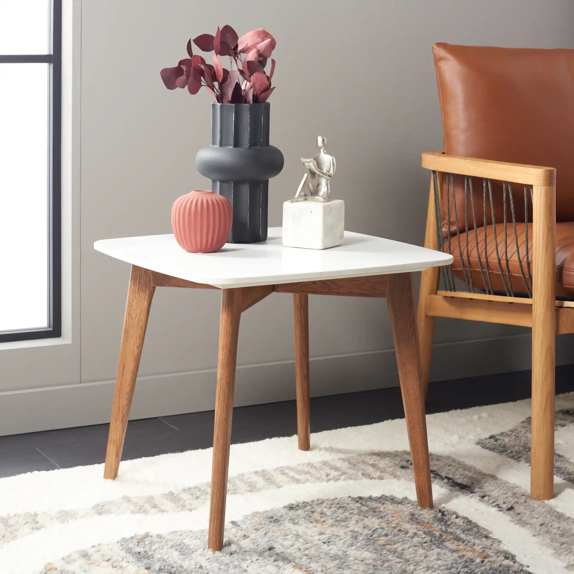 Karina Square End Table in White Ceramic Faux Marble / Walnut in a styled room
