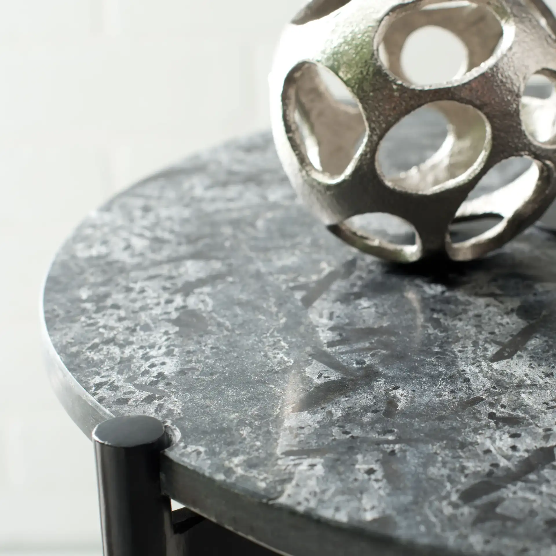 Pratt Round Side Table in Black in a styled room