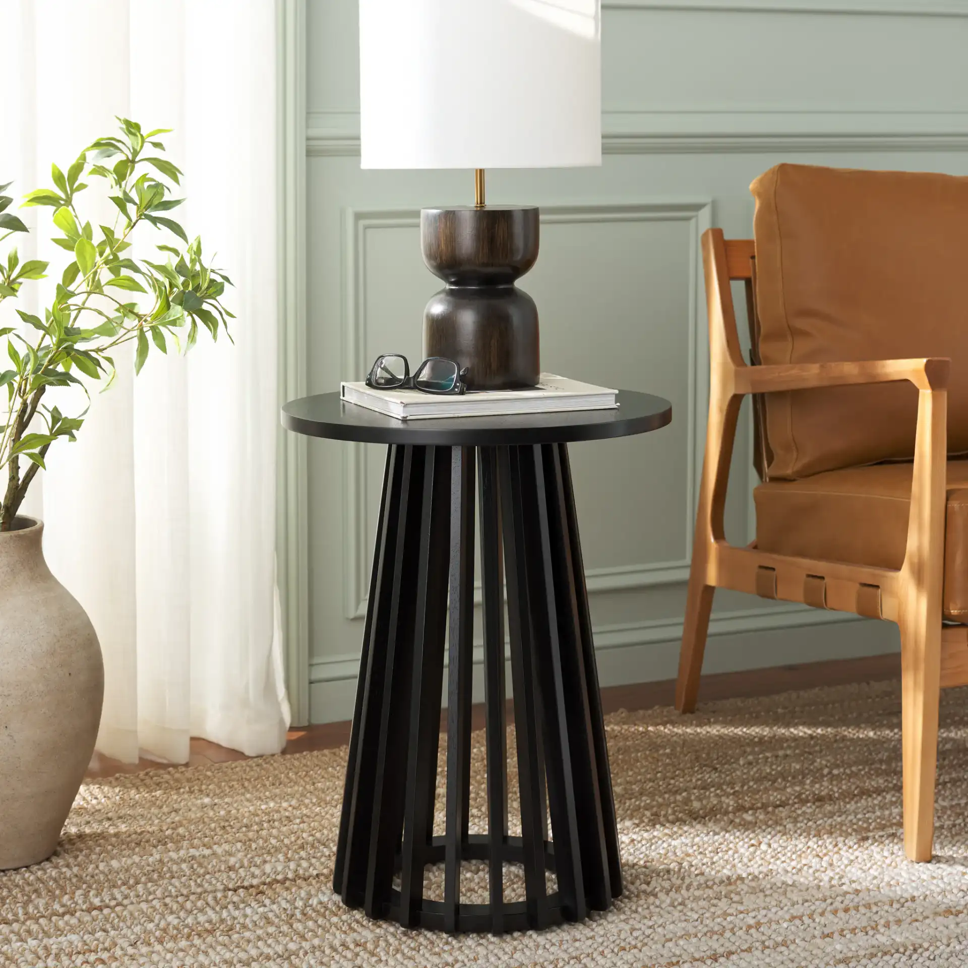 Cassio Accent Table in Black in a styled room
