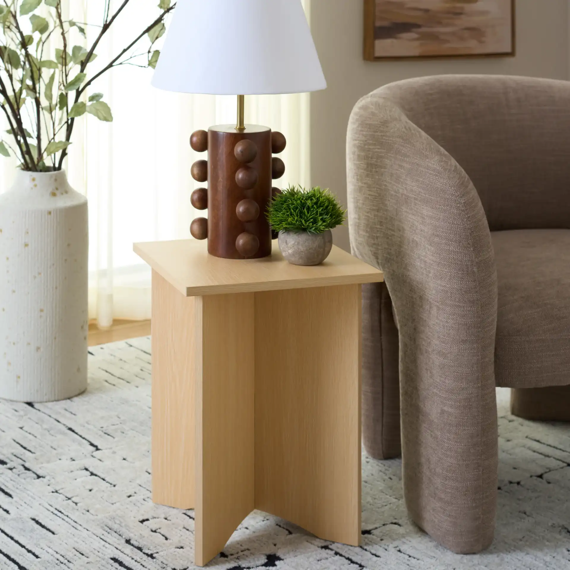 Elroy Accent Table in Sand in a styled room