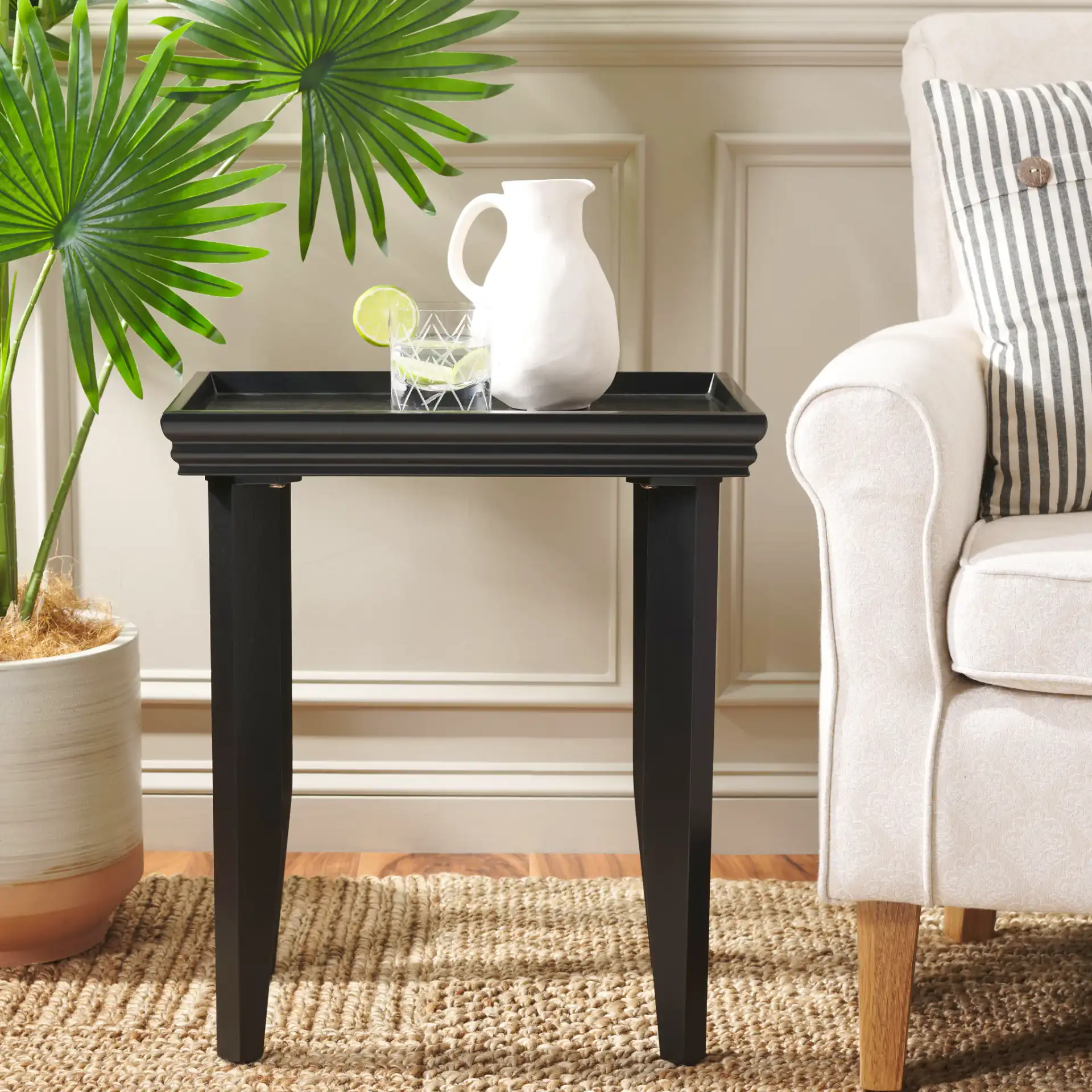 Naios Accent Table in Black in a styled room