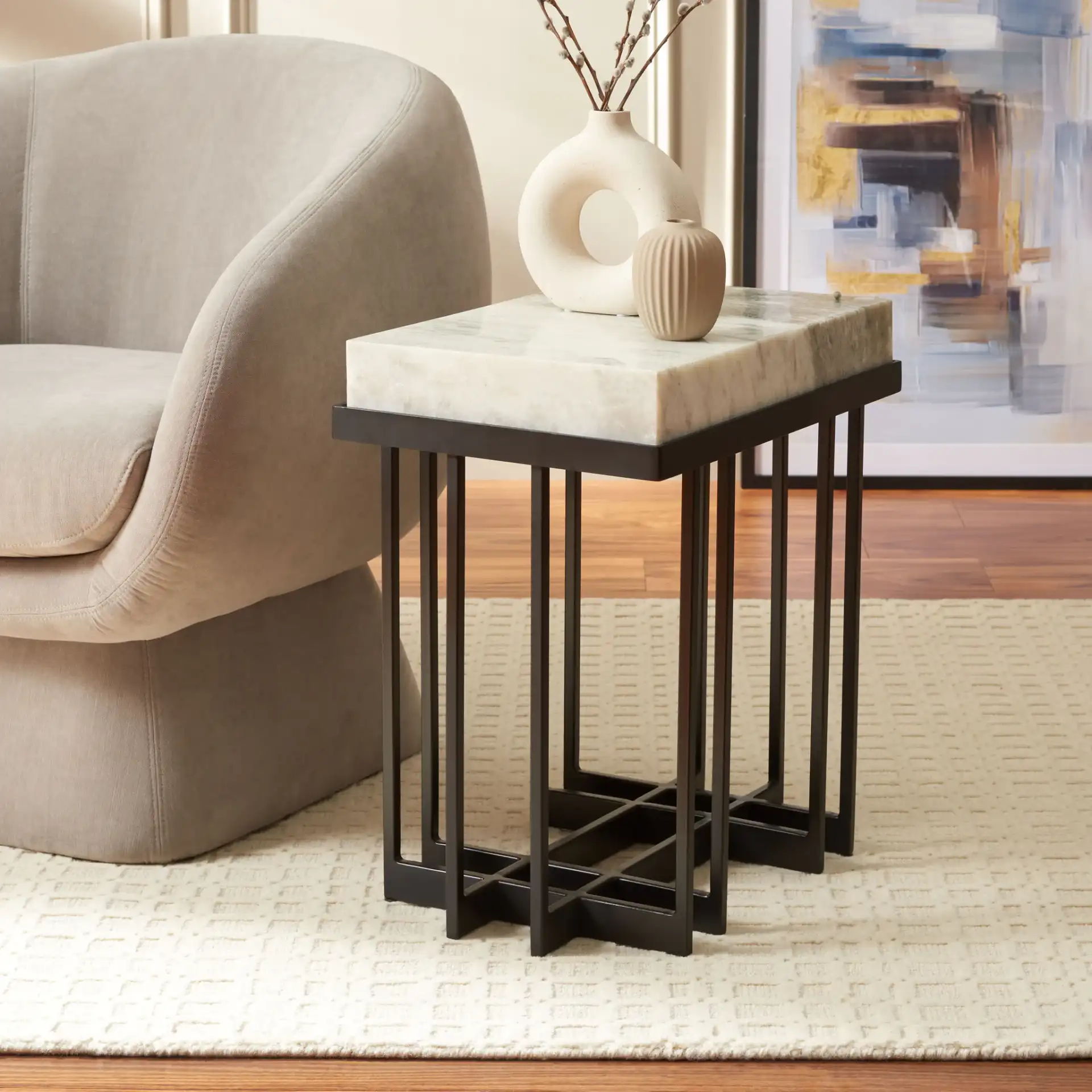 Gustaf Rectangle Accent Table in Sand Brown Marble / Black in a styled room