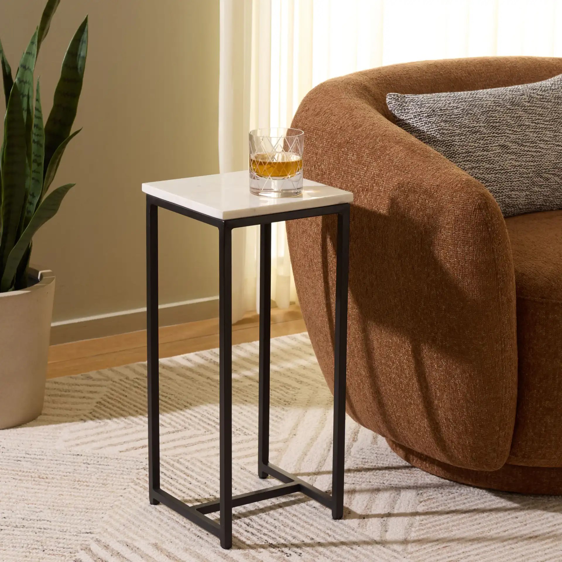 Dimitar Square Drink Accent Table in White Marble / Black in a styled room
