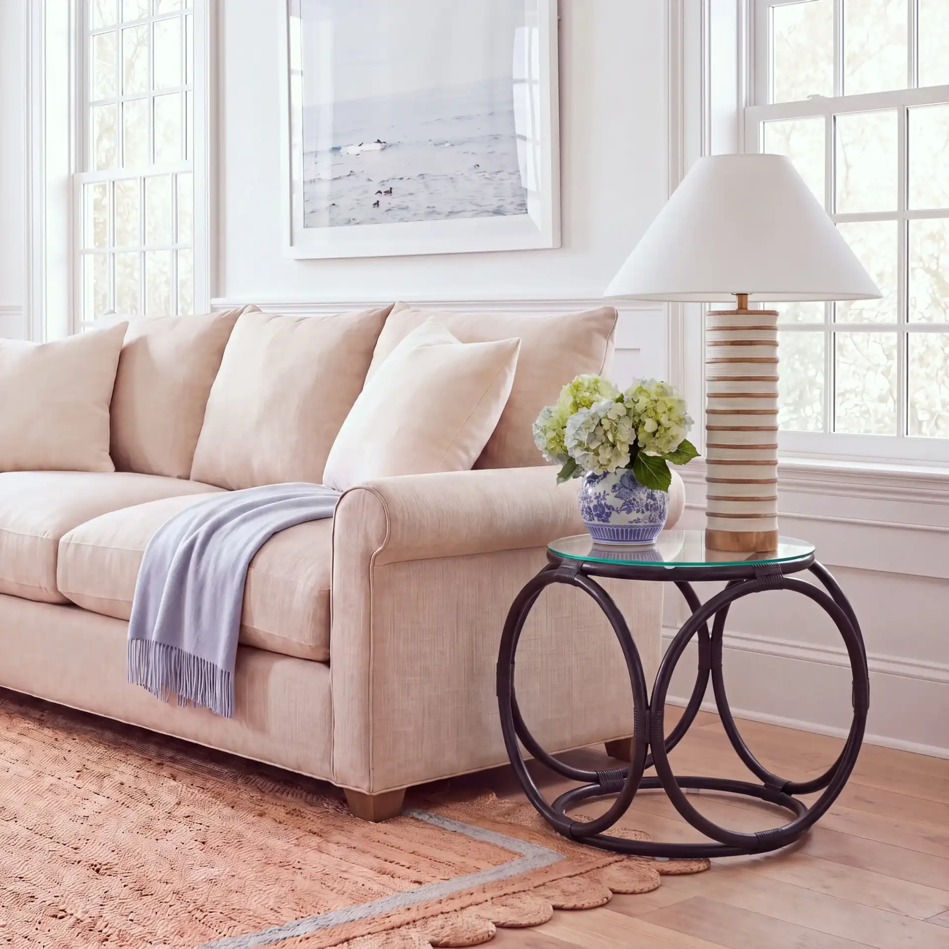 Alesha Round Accent Table in Black / Glass in a styled room