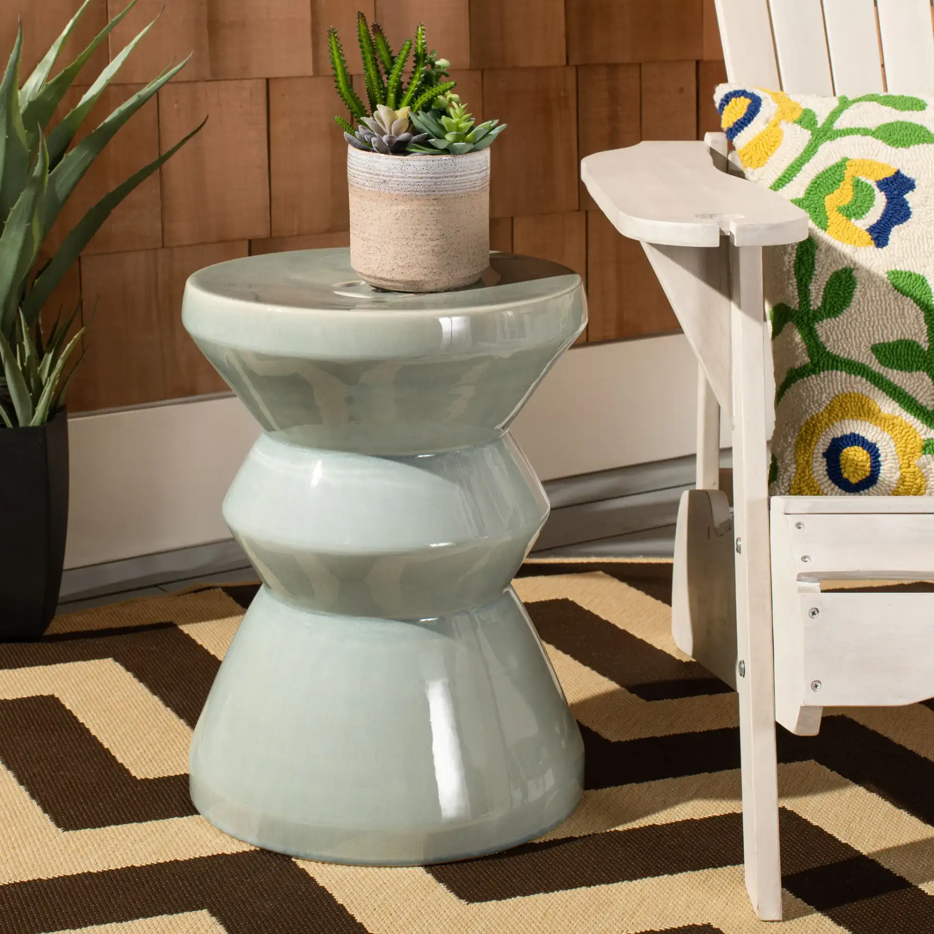 Larsa Garden Stool in Blue in a styled room