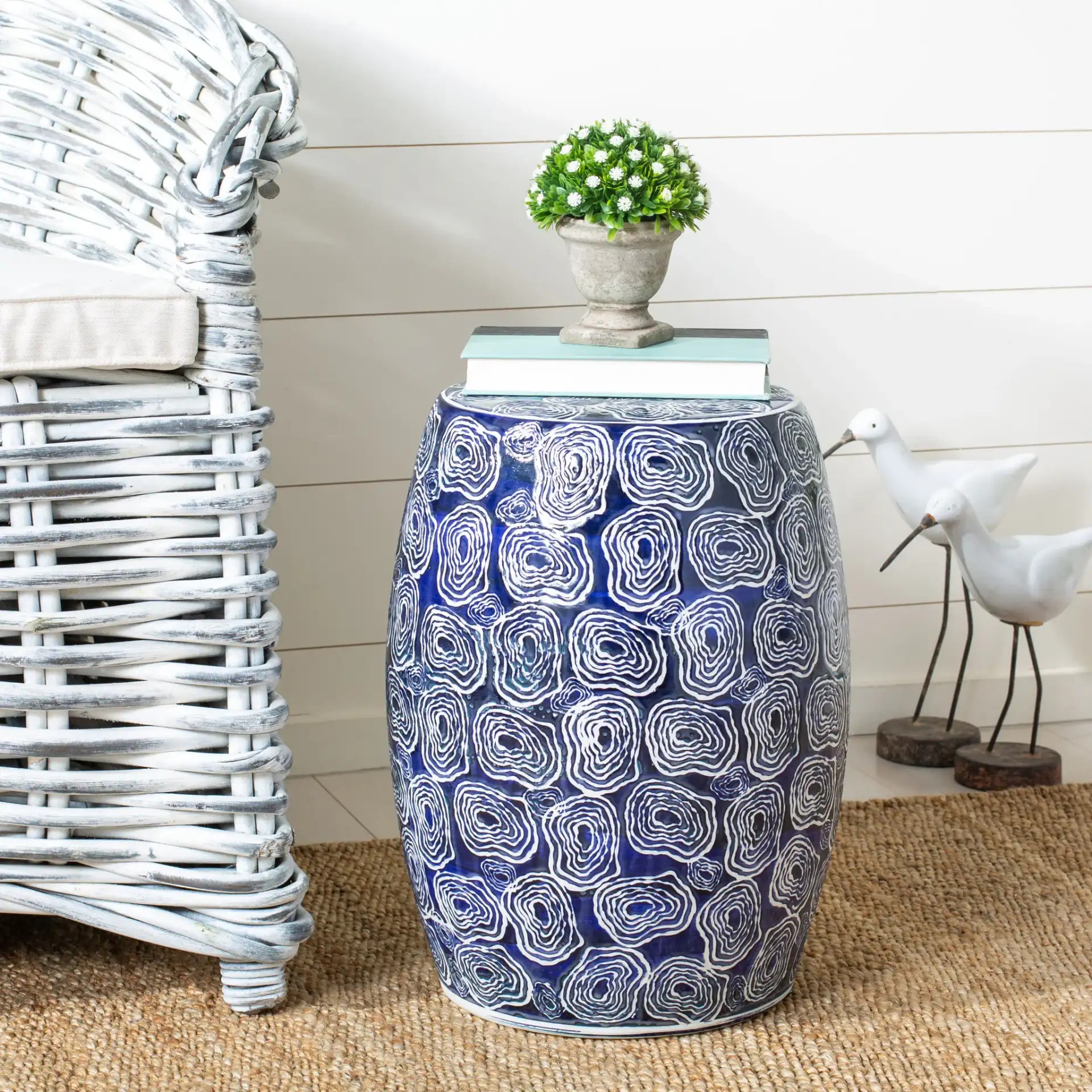 Lorey Garden Stool in Blue / White in a styled room