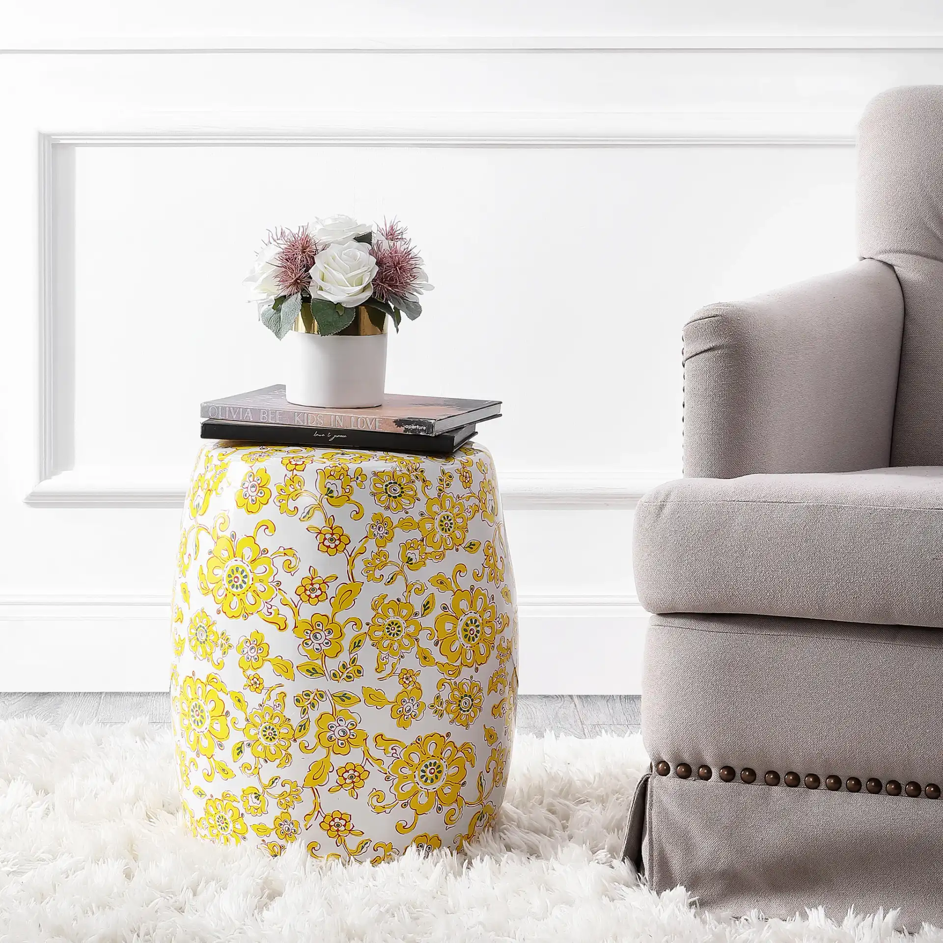 Rainer Garden Stool in Yellow in a styled room