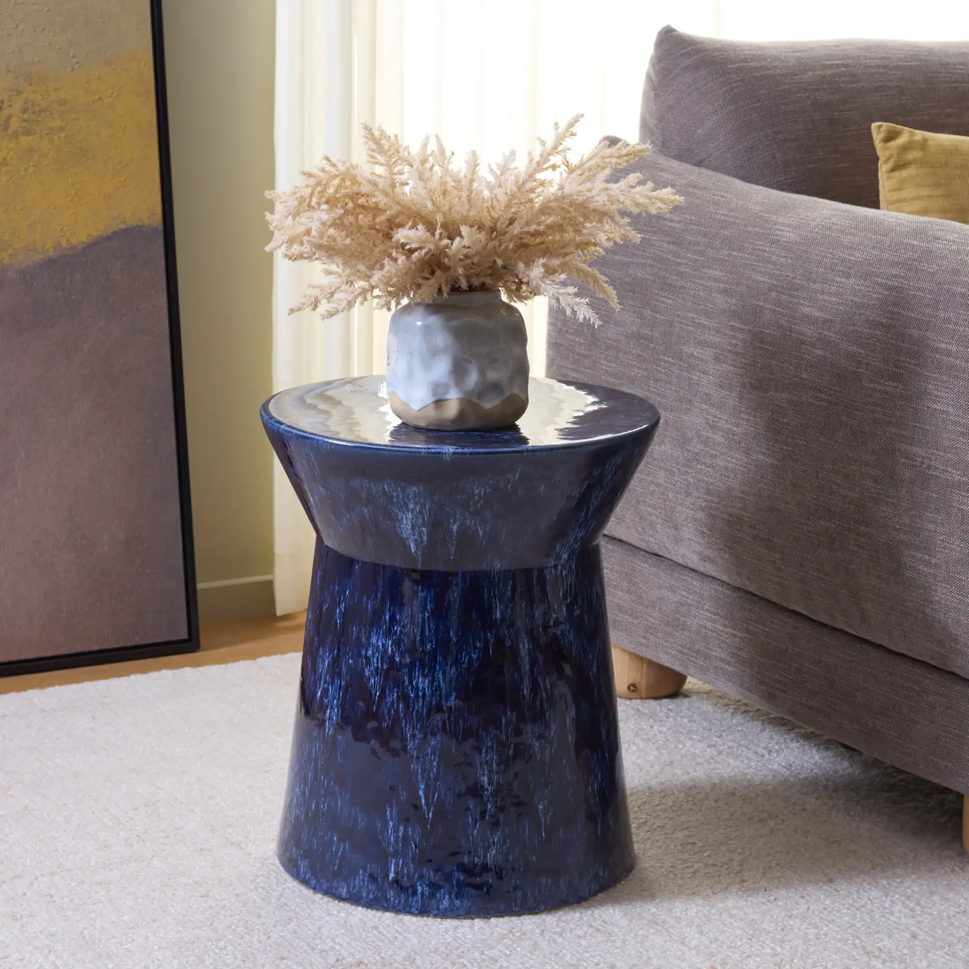 Lessa Garden Stool in Blue in a styled room