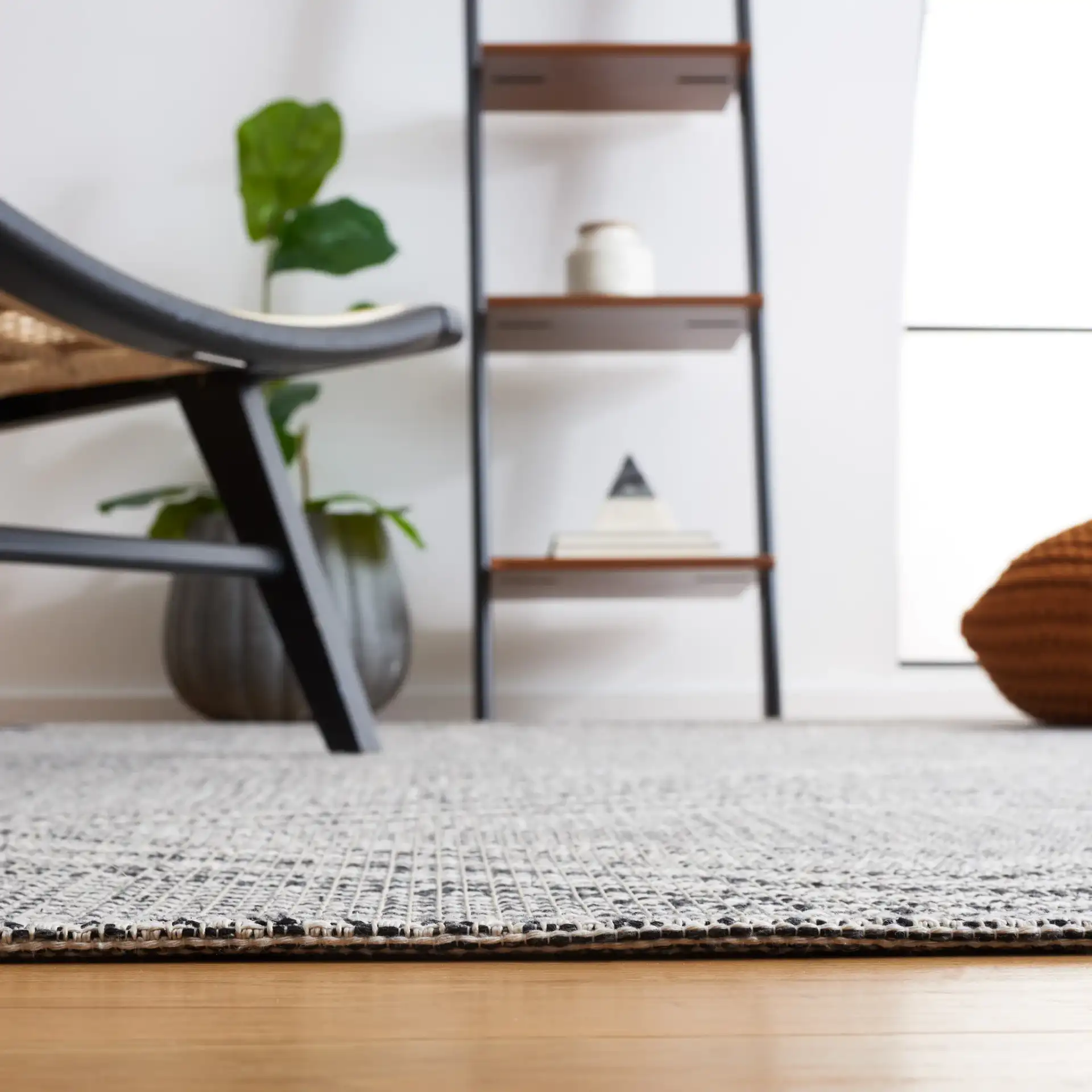 Augustine Concentric Diamond Rug in Ivory / Black in a styled room