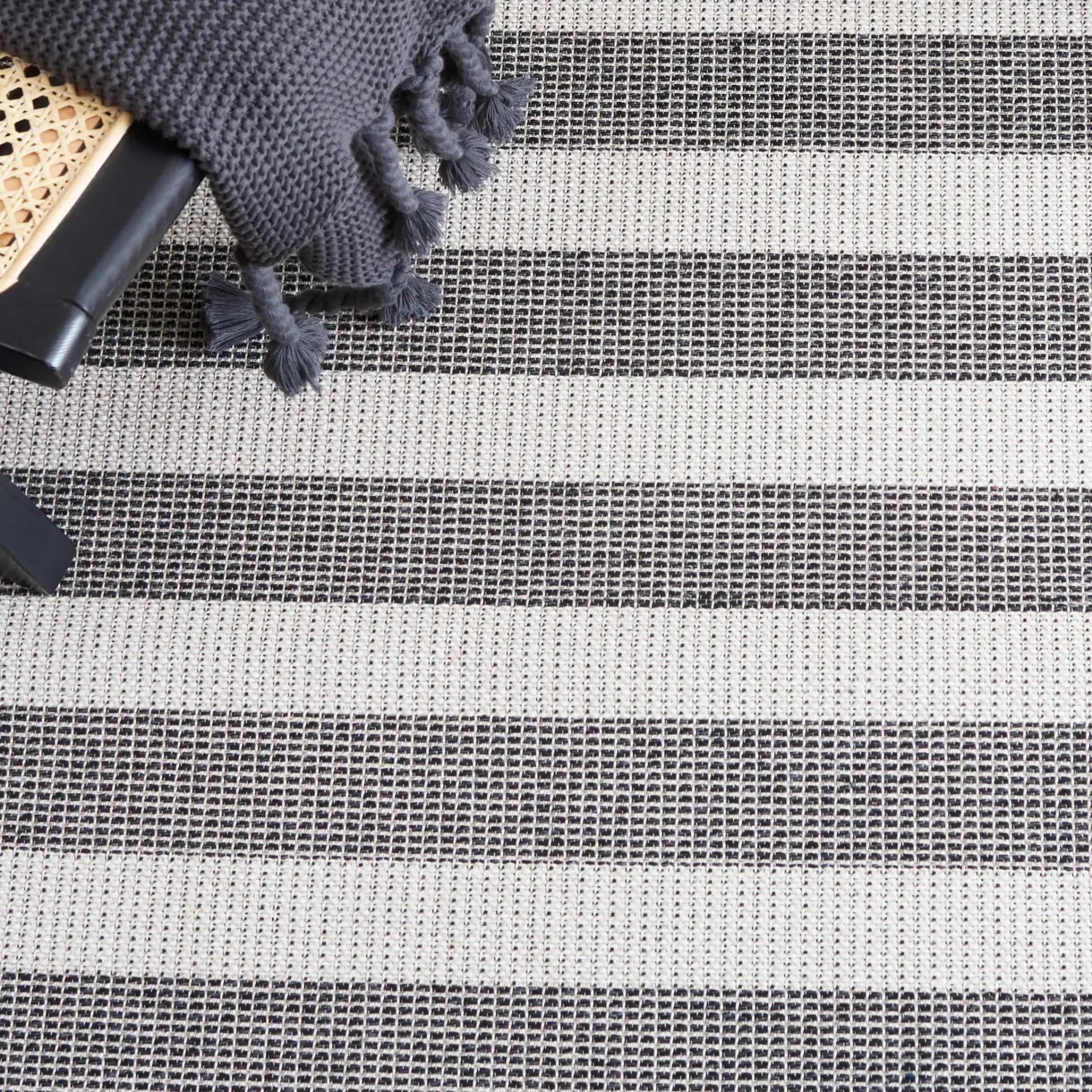 Augustine Striped Rug in Ivory / Black in a styled room