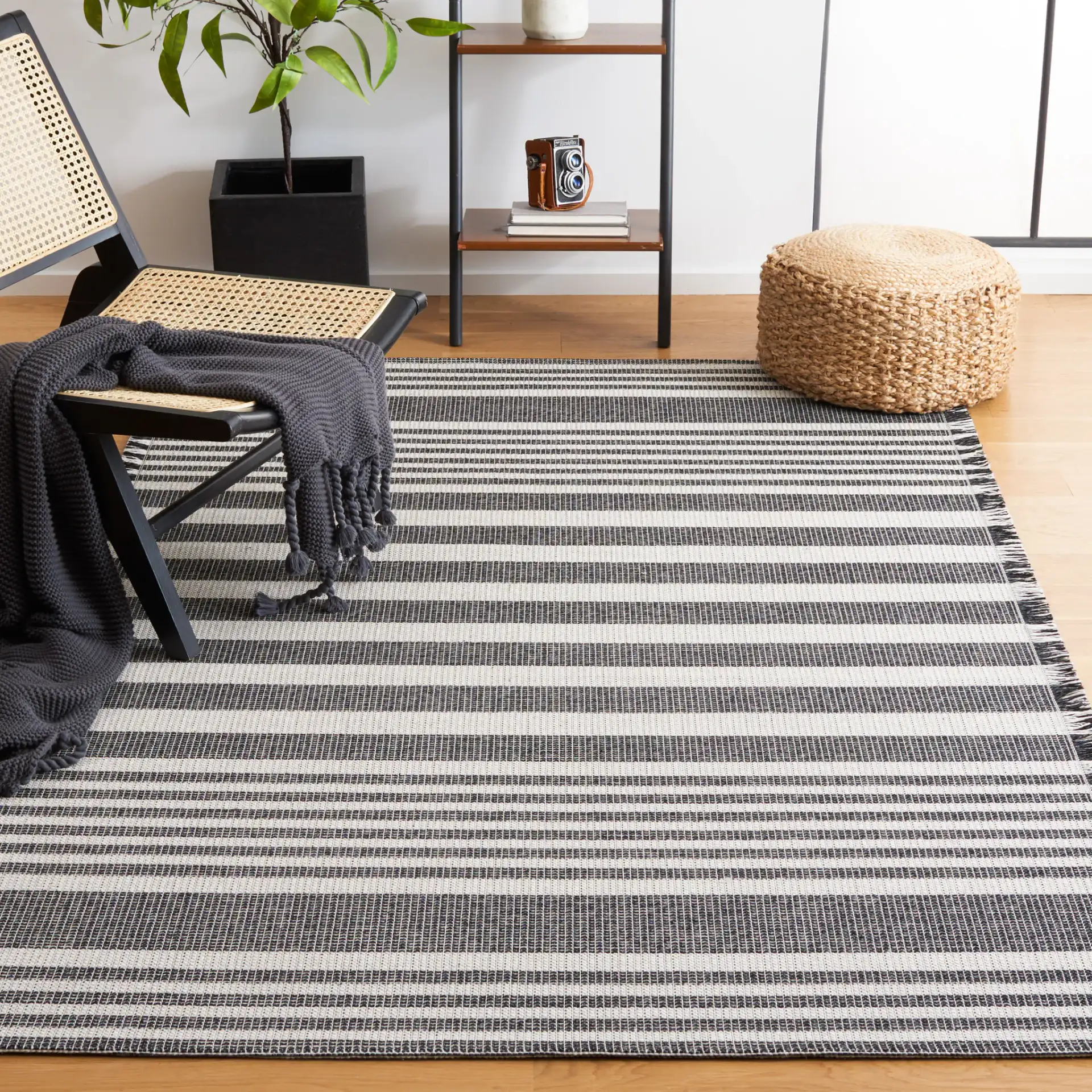 Augustine Striped Rug in Ivory / Black in a styled room