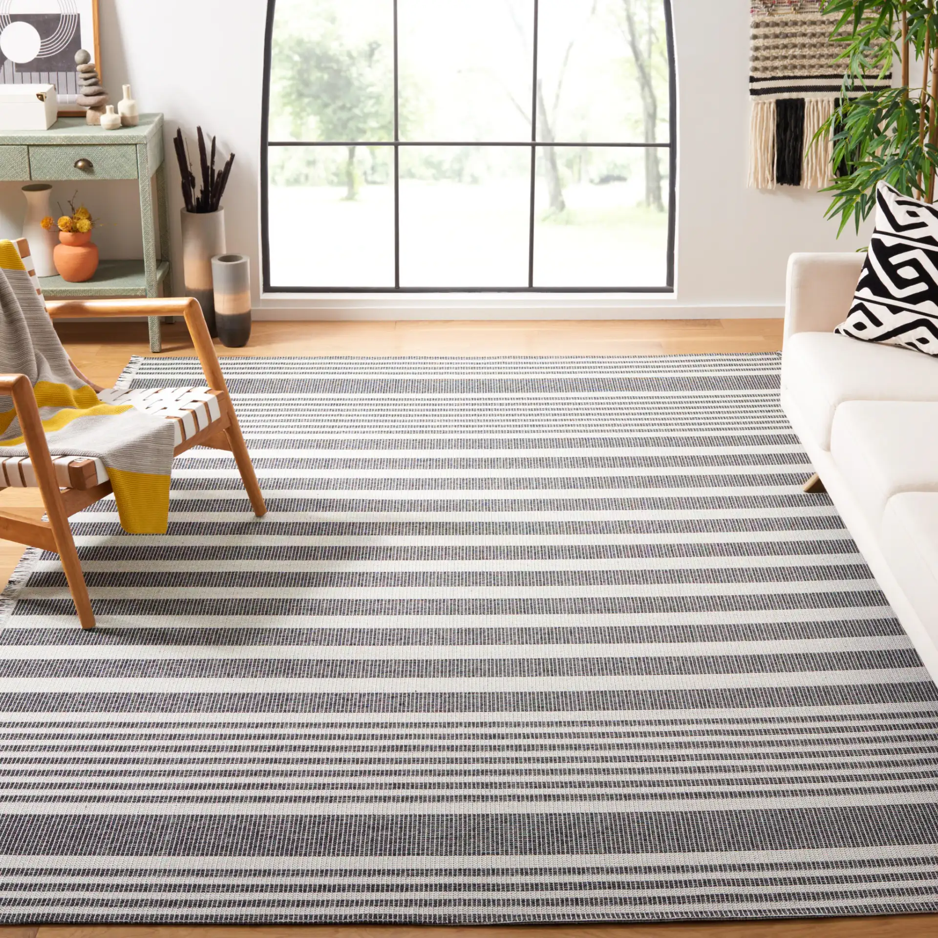 Augustine Striped Rug in Ivory / Black in a styled room
