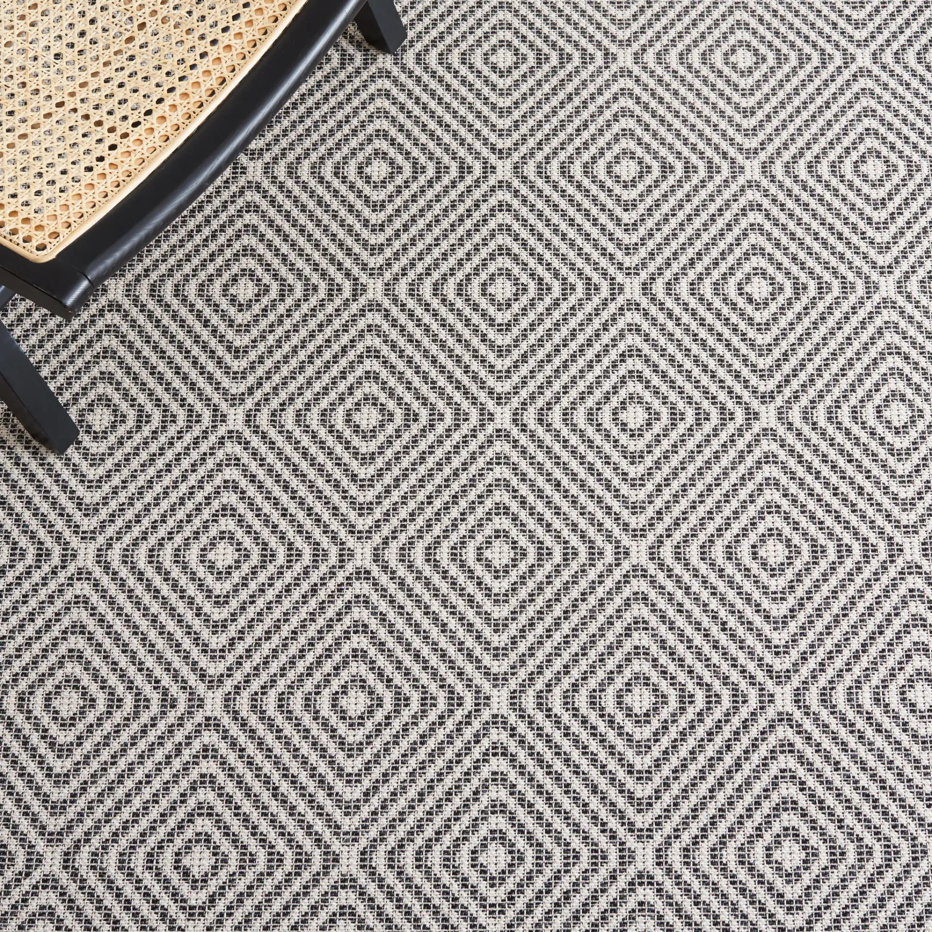 Augustine Nested Diamond Rug in Ivory / Black in a styled room