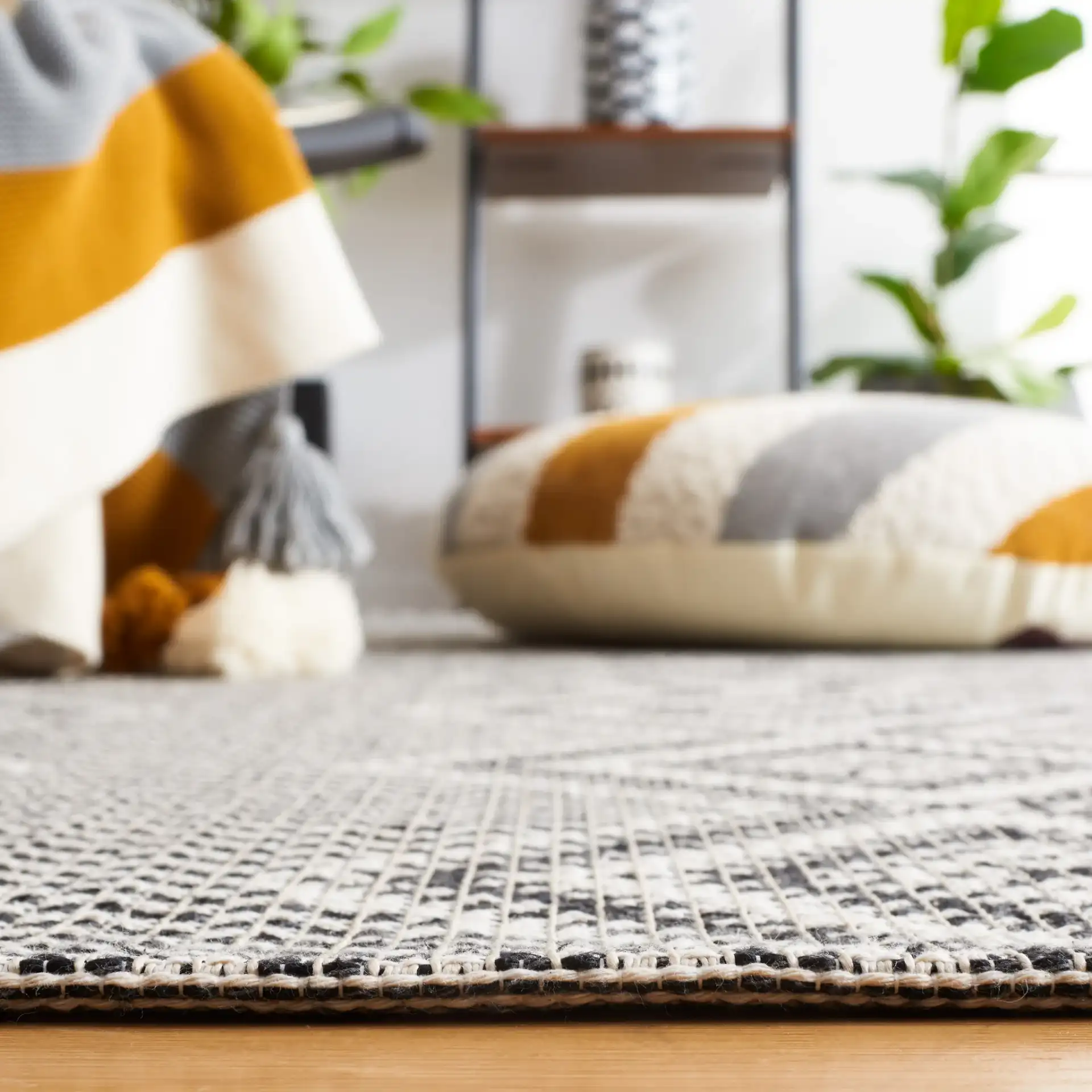 Augustine Diamond Column Rug in Ivory / Black in a styled room