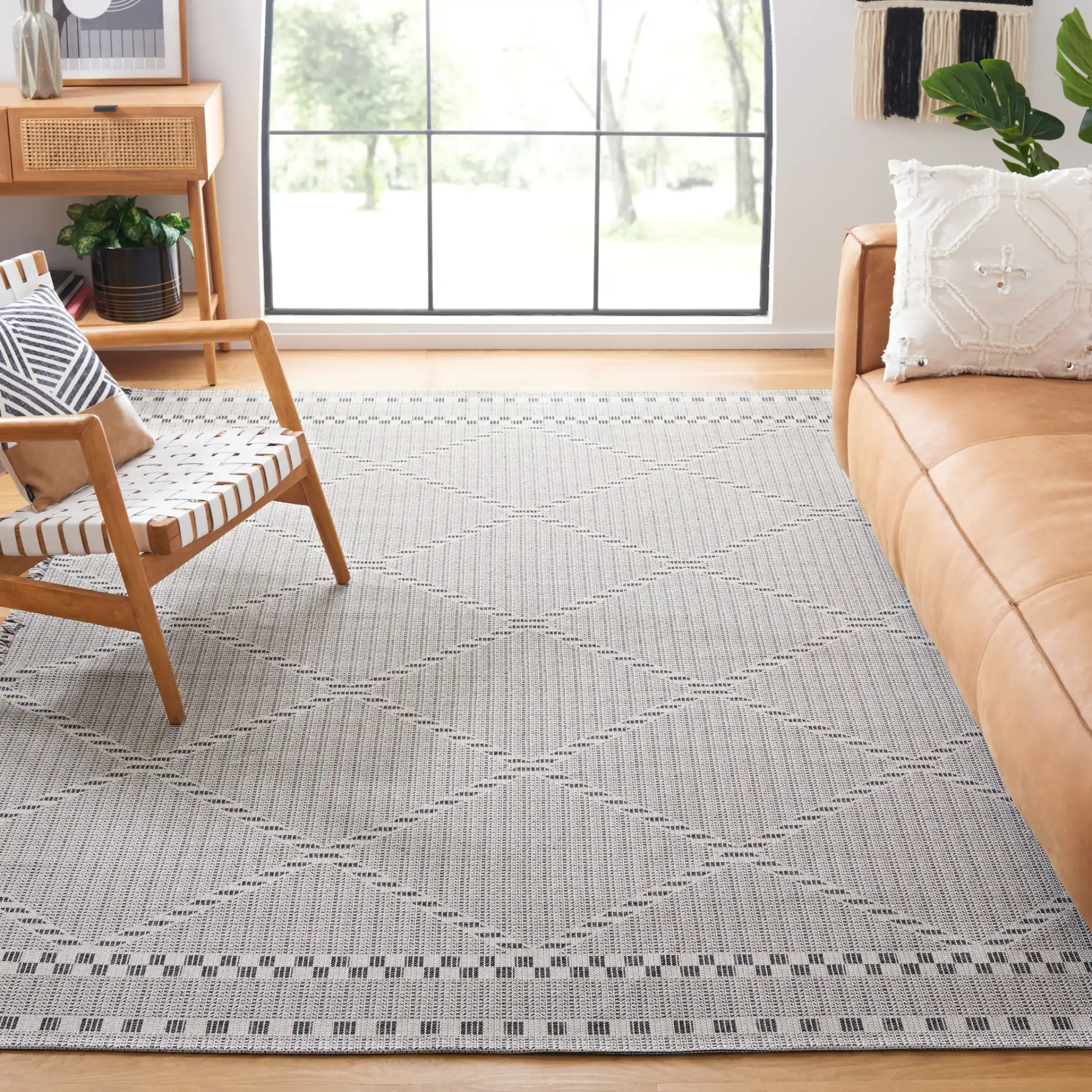 Augustine Large Scale Diamond Rug in Ivory / Black in a styled room