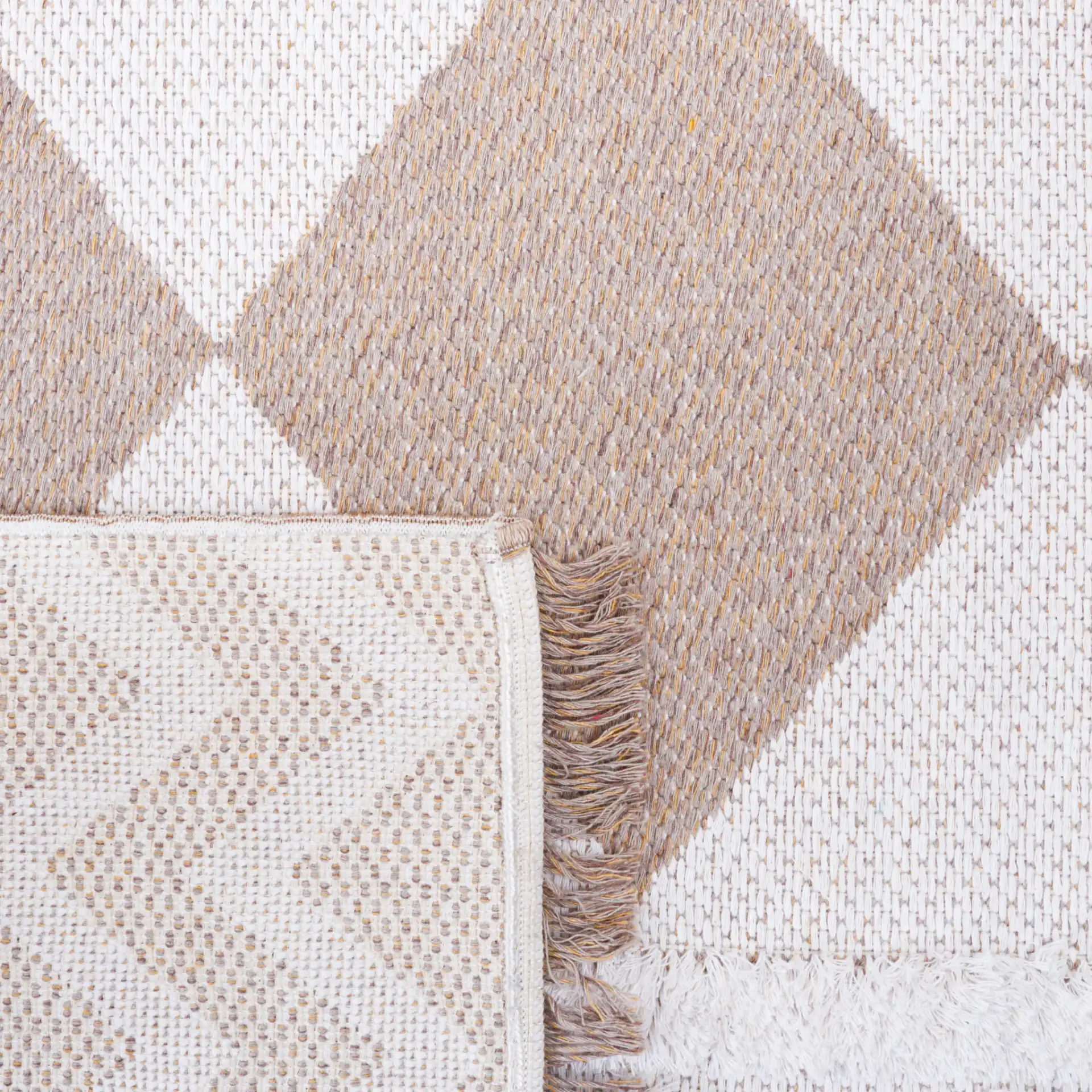 Augustine Chevron Diamond Rug in Ivory / Beige in a styled room